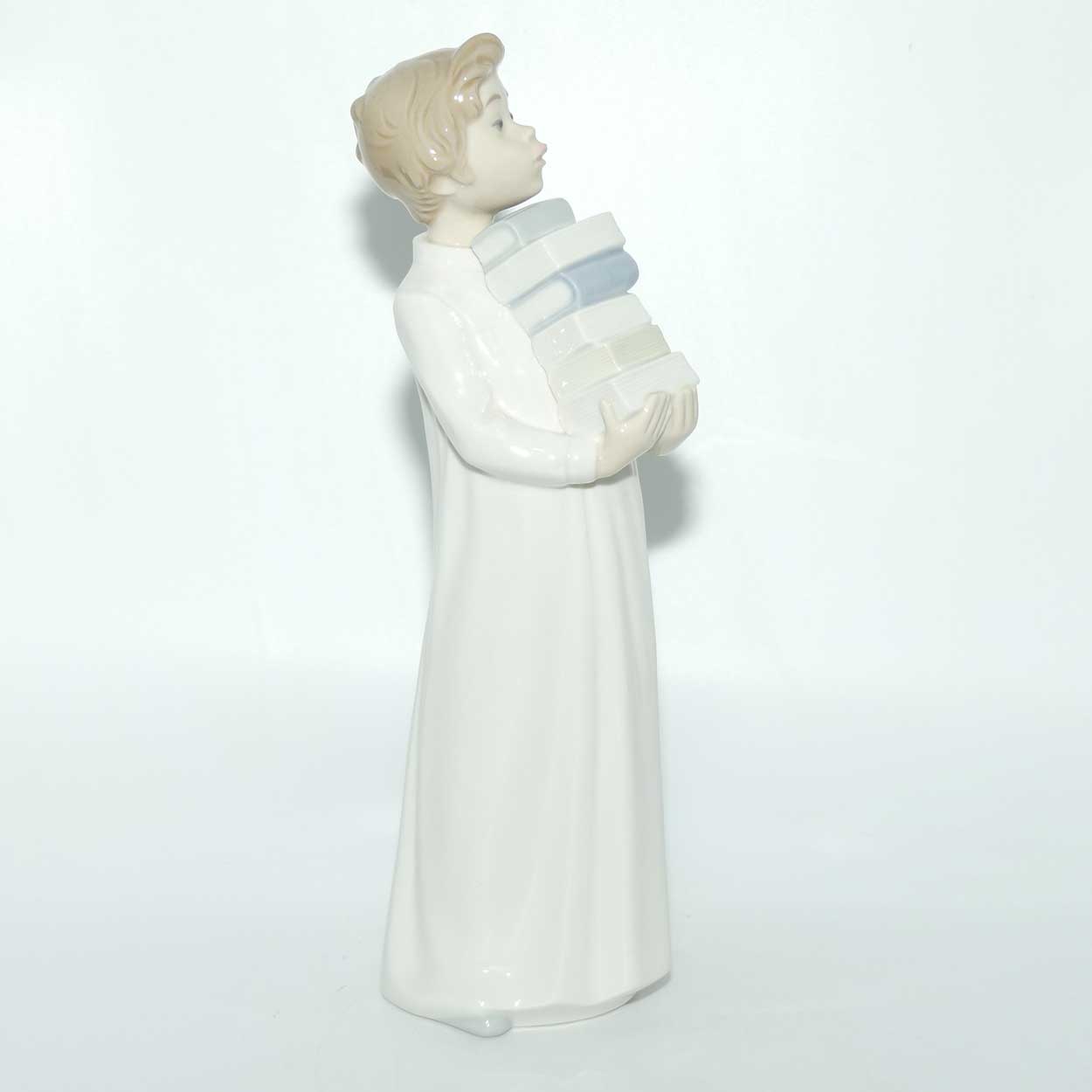 Nao by Lladro figure Boy in Nightshirt with Books #0233