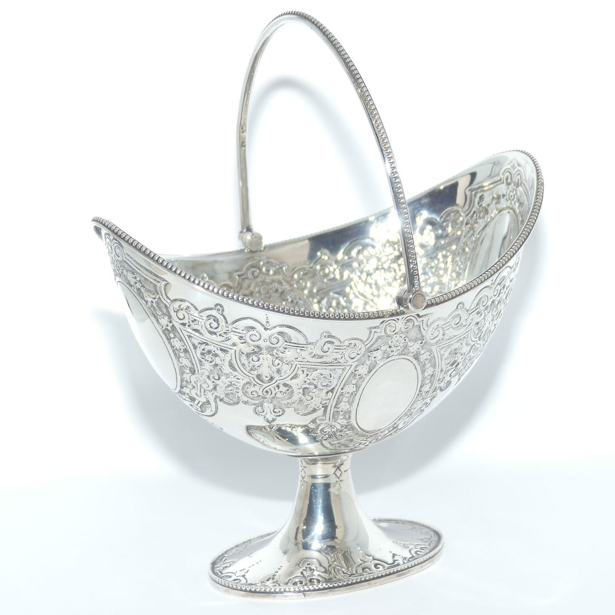 Victorian era Sterling Silver swing handle collet foot sugar basket | London 1875 | Martin Hall & Co