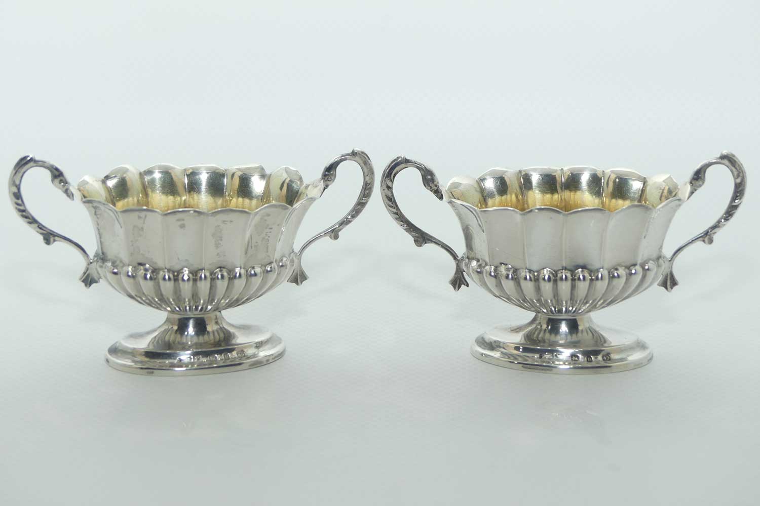 Victorian era Sterling Silver open salts in Campagna vase form with blue glass liners | Birmingham 1876