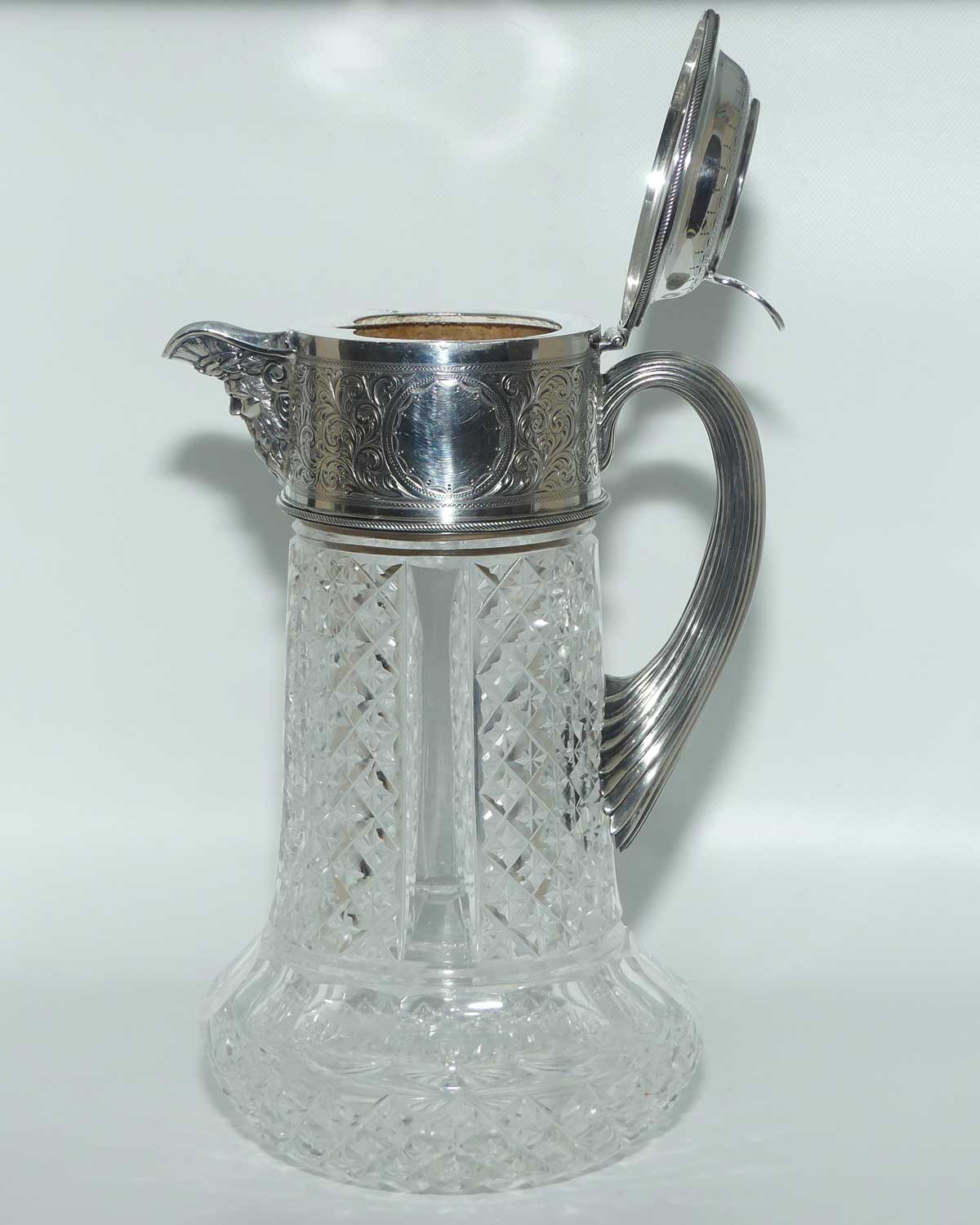 Victorian era Sterling Silver Bacchus spout and Cut Crystal claret jug | London 1882