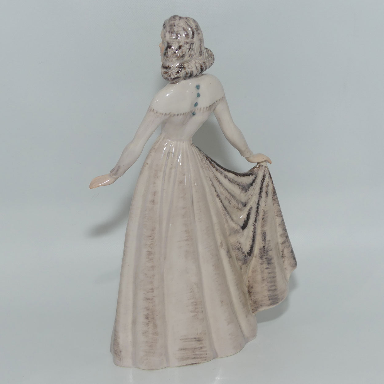 Wedgwood and Co figure #67 Lady holding Dress