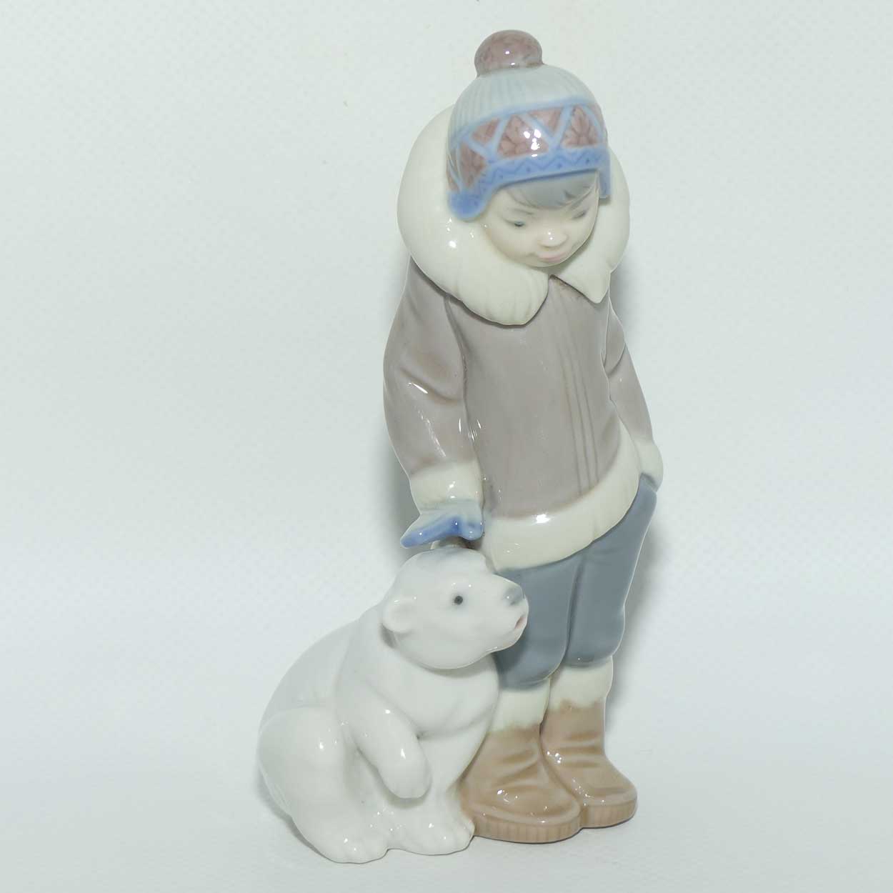 Lladro figurine Eskimo Boy with Pet #5238