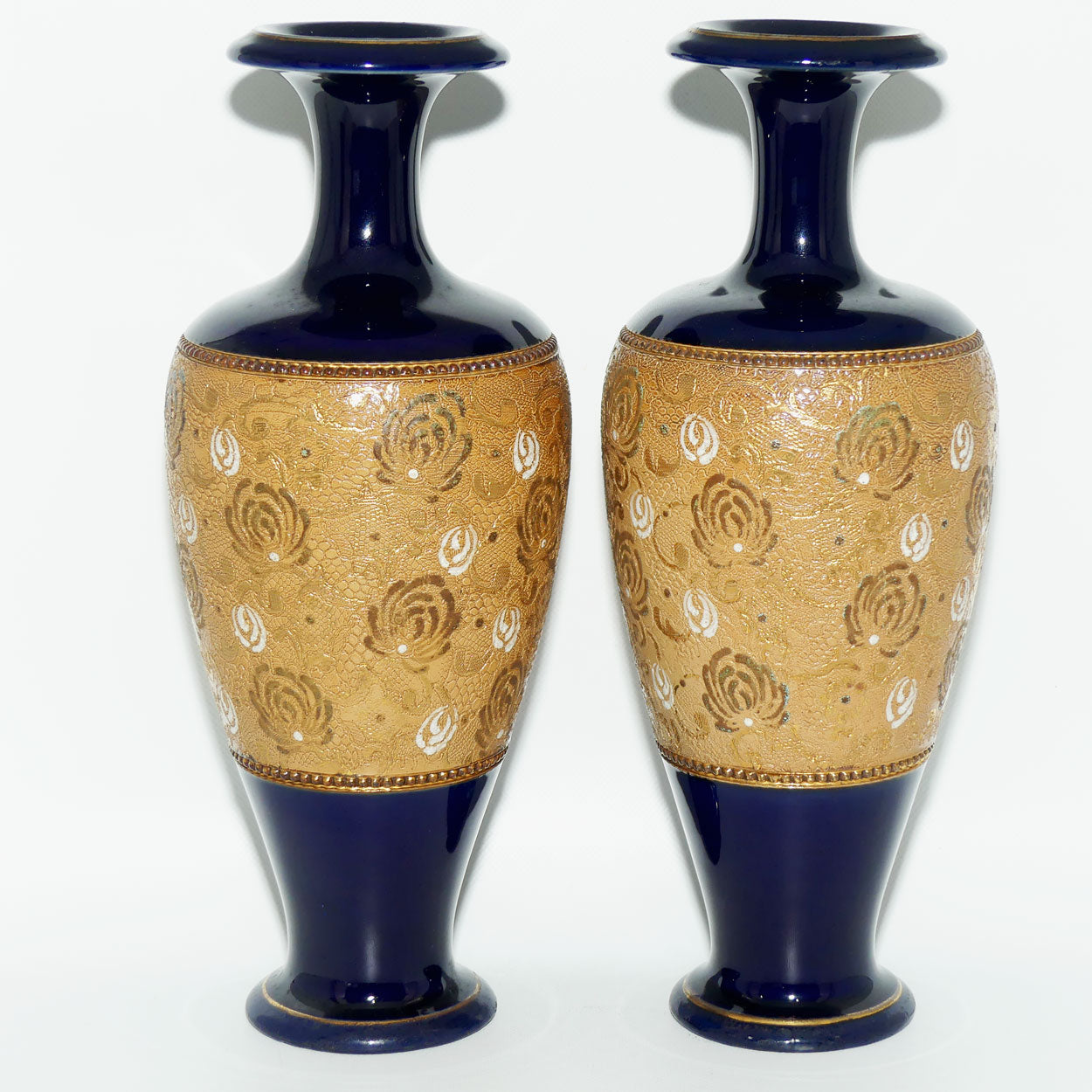 Doulton Slaters pair of stoneware vases with white enamelling & gilt highlights (stamped 6038)
