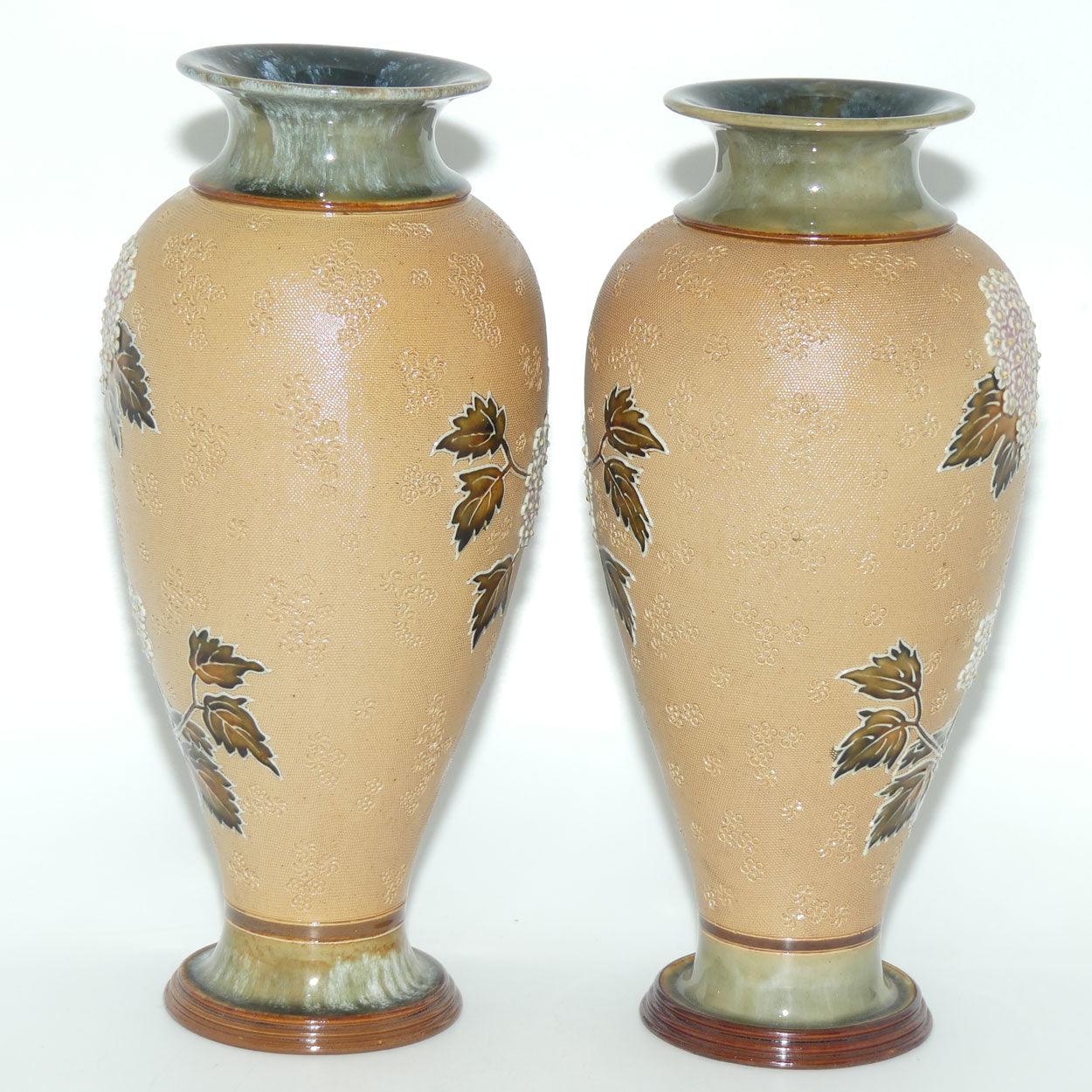 Doulton Slaters pair of stoneware foliage and flowers vases (stamped 6482)