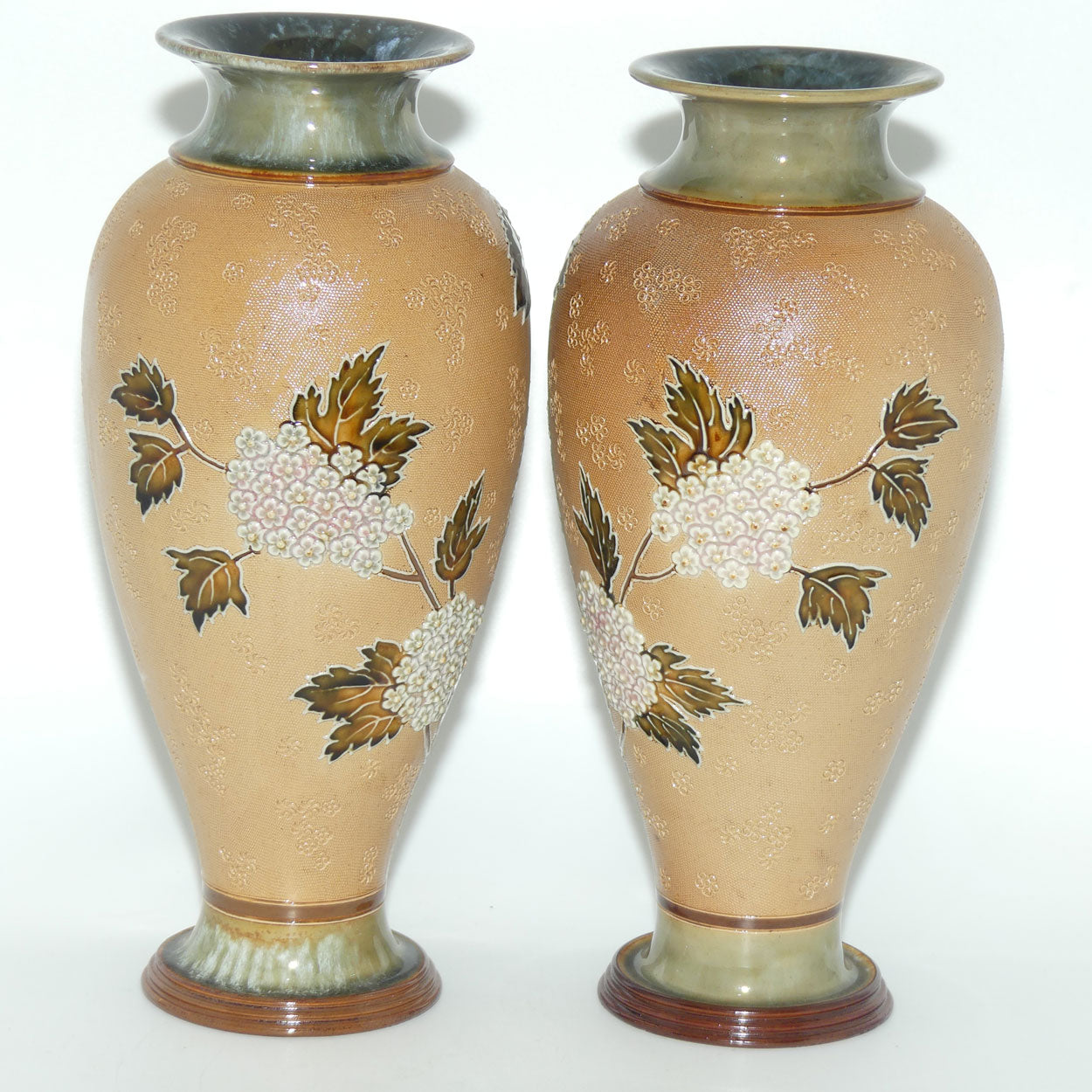 Doulton Slaters pair of stoneware foliage and flowers vases (stamped 6482)