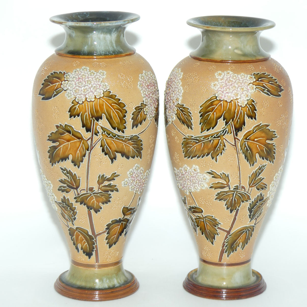 Doulton Slaters pair of stoneware foliage and flowers vases (stamped 6482)