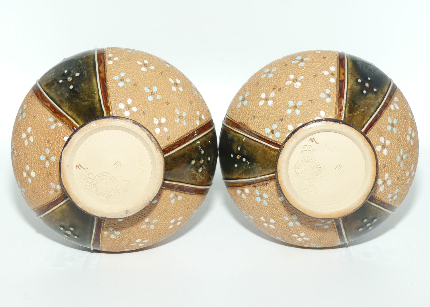 Royal Doulton stoneware pair of narrow neck bulbous vases with blue & white enamelling highlights (stamped 8331)