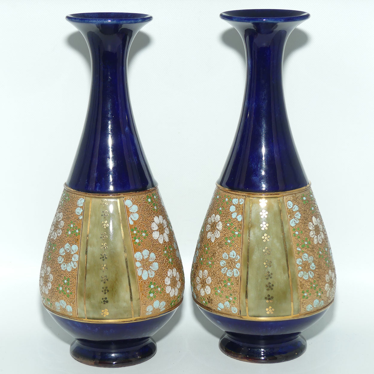 Royal Doulton pair of stoneware vases with blue, green & white enamelled flowers and gilt highlights (stamped 8334) #1