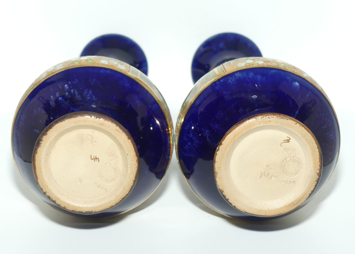 Royal Doulton pair of stoneware vases with blue, green & white enamelled flowers and gilt highlights (stamped 8334) #1