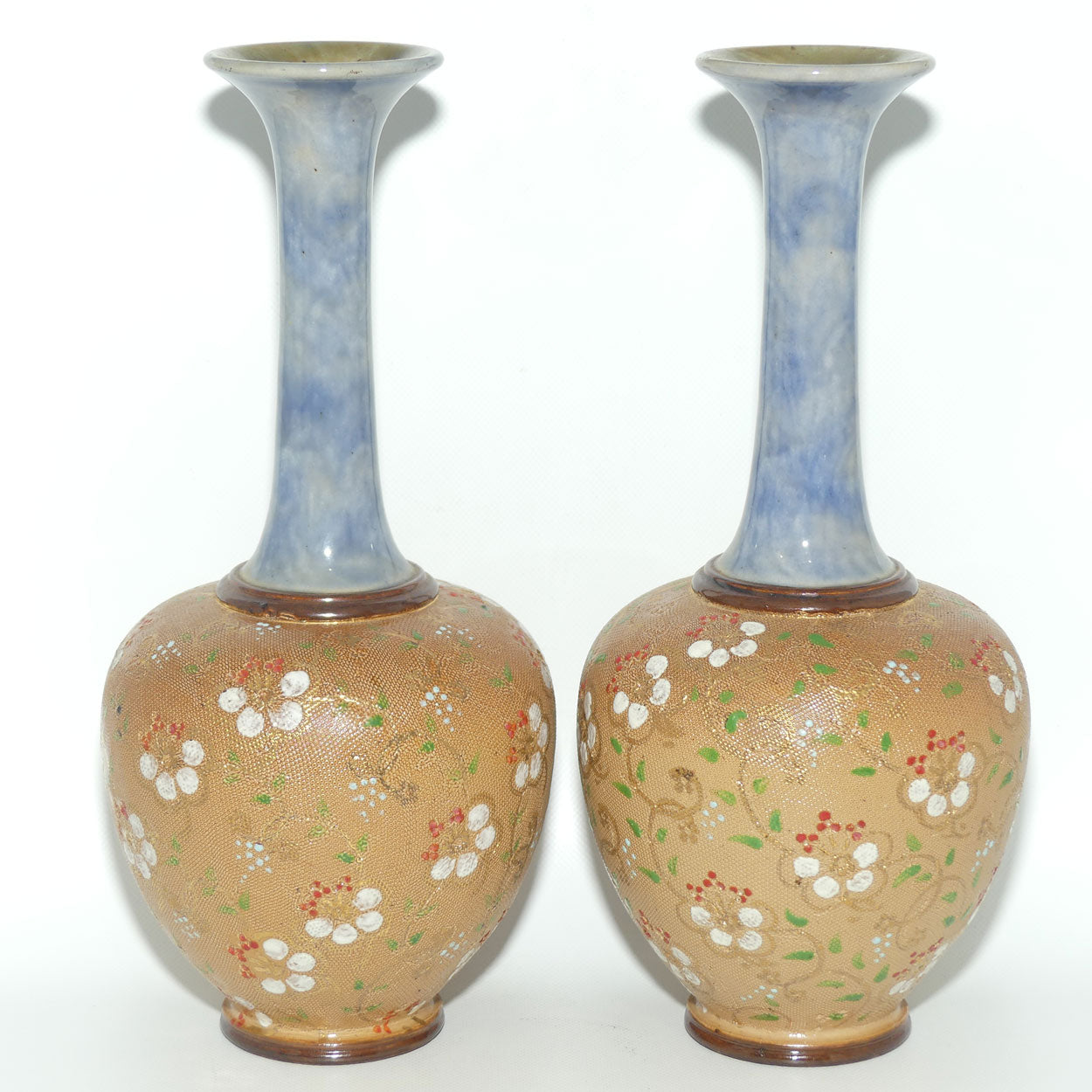 Royal Doulton pair of stoneware narrowneck bulbous vases with red, white & green enamelling and gilt highlights (stamped 8420)