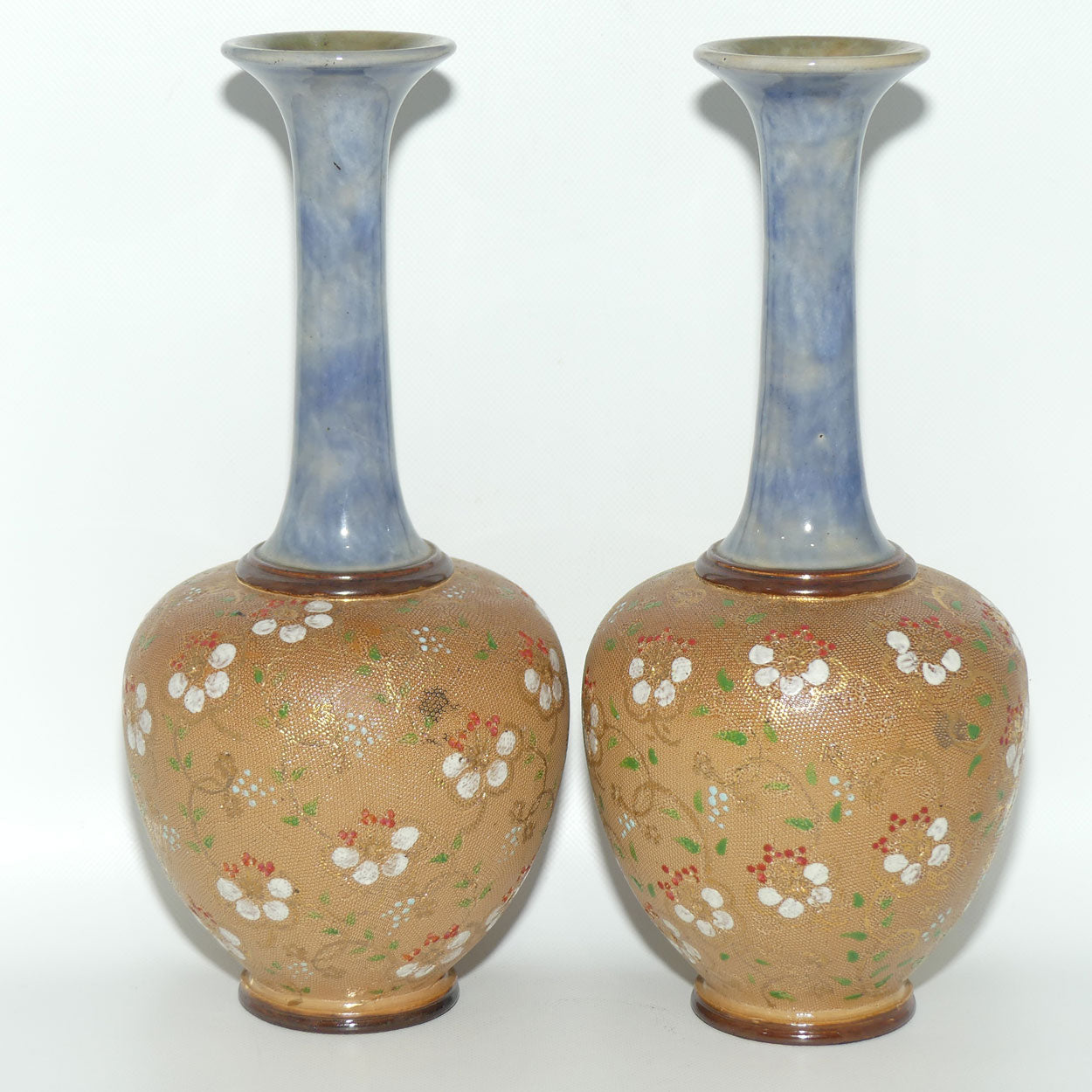 Royal Doulton pair of stoneware narrowneck bulbous vases with red, white & green enamelling and gilt highlights (stamped 8420)