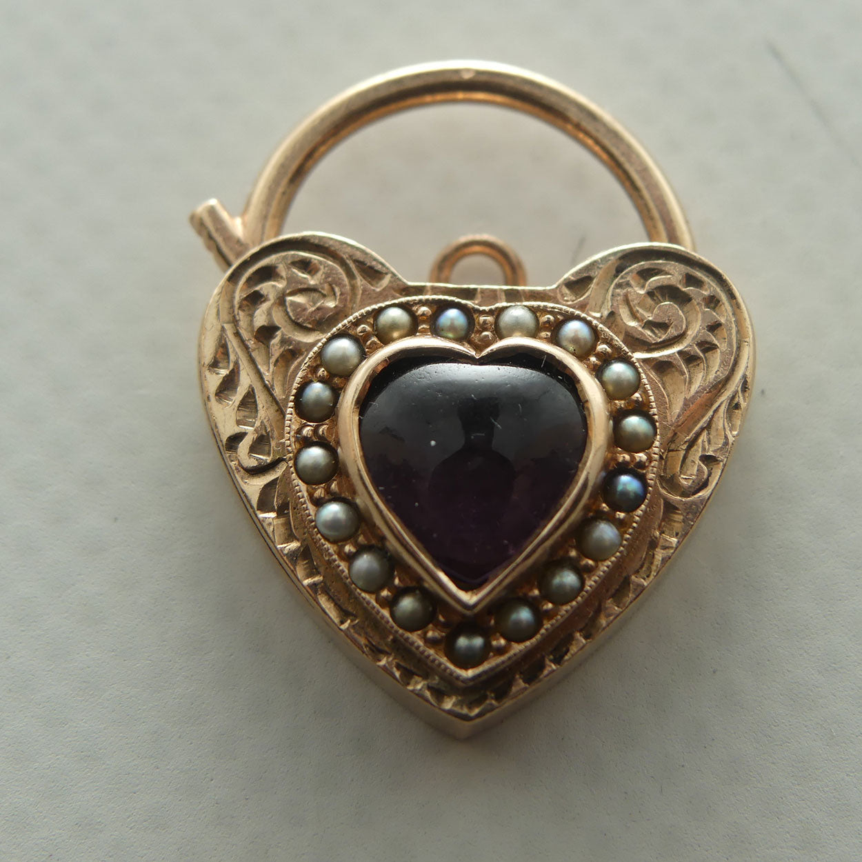 9ct Yellow Gold Heart Padlock set with Cabochon Amethyst and Seed Pearls | Valued $5900