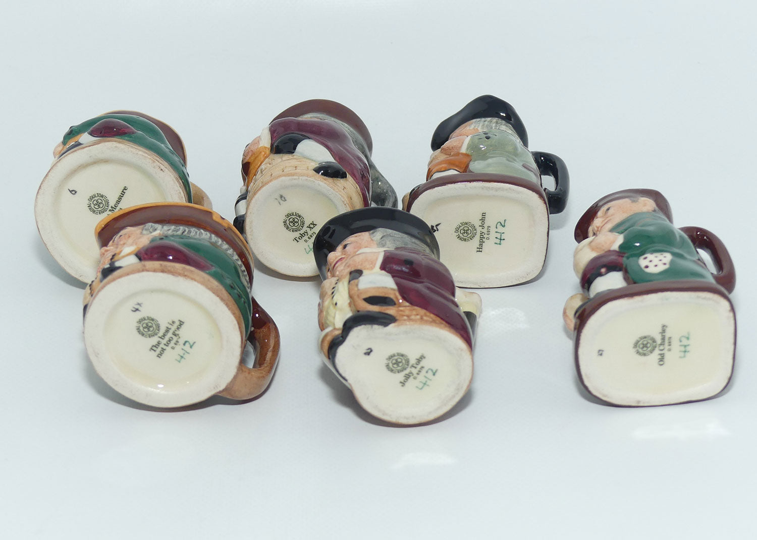 D6974 to D6979 Royal Doulton Tiny Toby set of 6 on stand