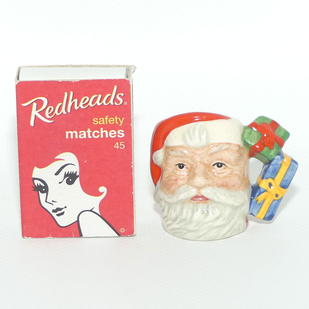 D7020 Royal Doulton tiny character jug Santa | Parcels handle