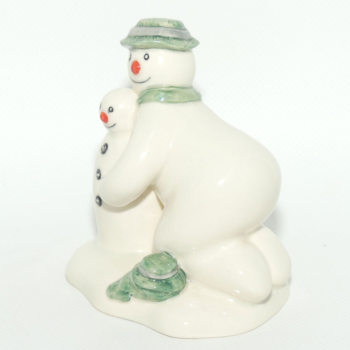 DS23 Royal Doulton Snowman figure Building the Snowman