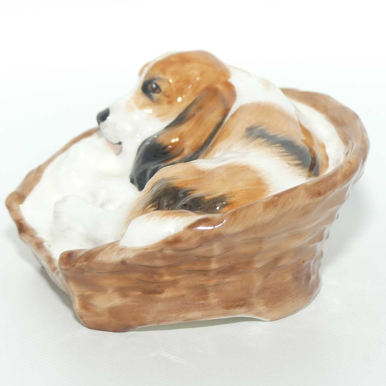 HN2585 Royal Doulton Cocker Spaniel Lying in a Basket
