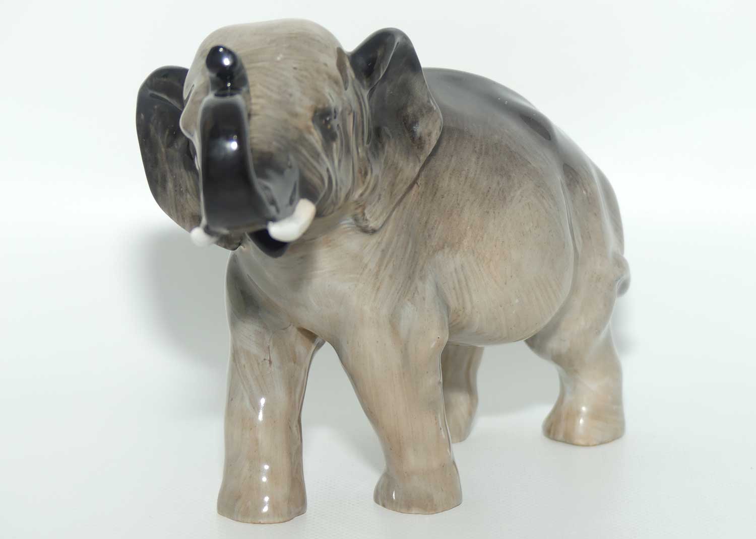 HN2644 Royal Doulton Elephant Trunk in Salute (Grey)