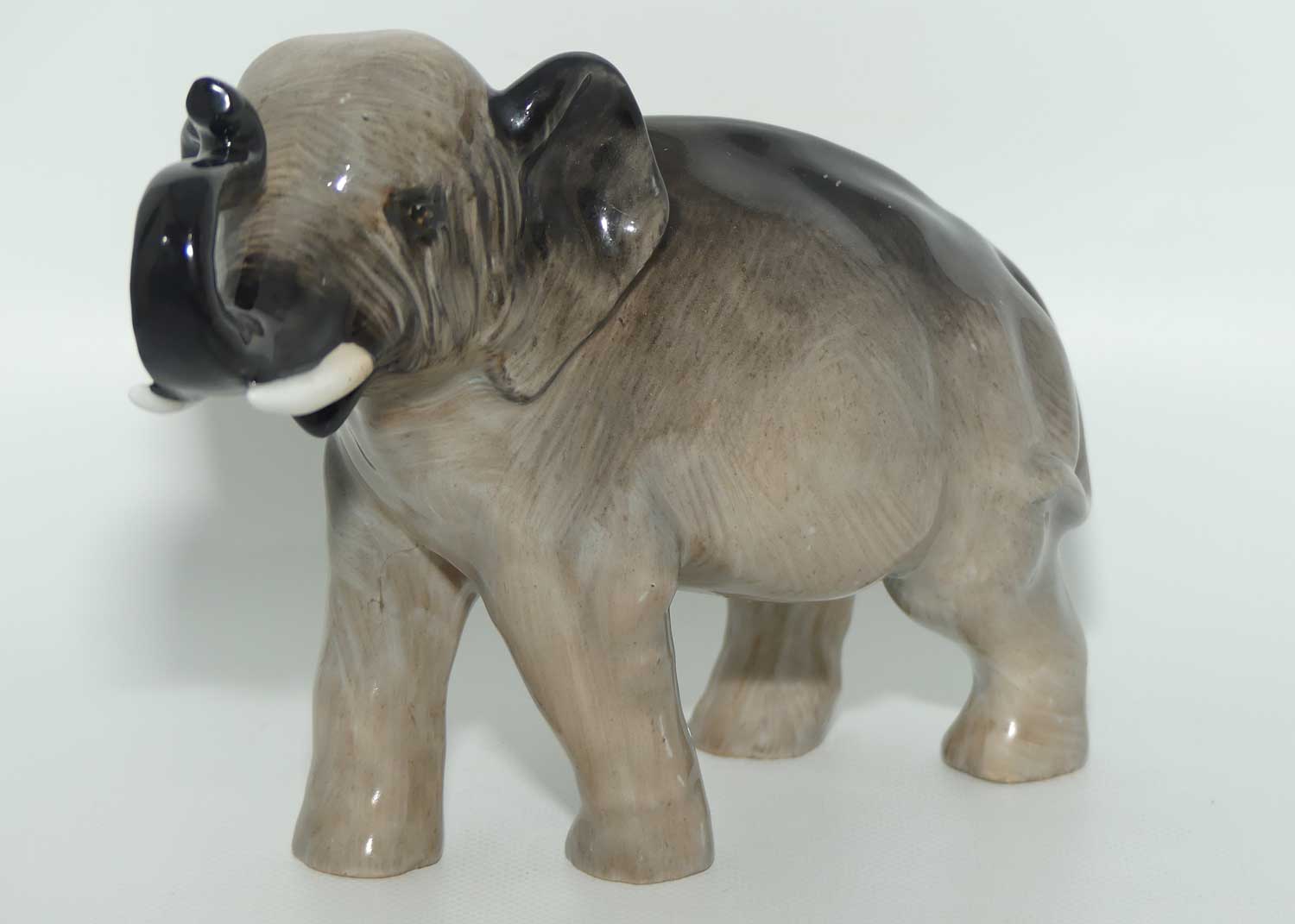 HN2644 Royal Doulton Elephant Trunk in Salute (Grey)