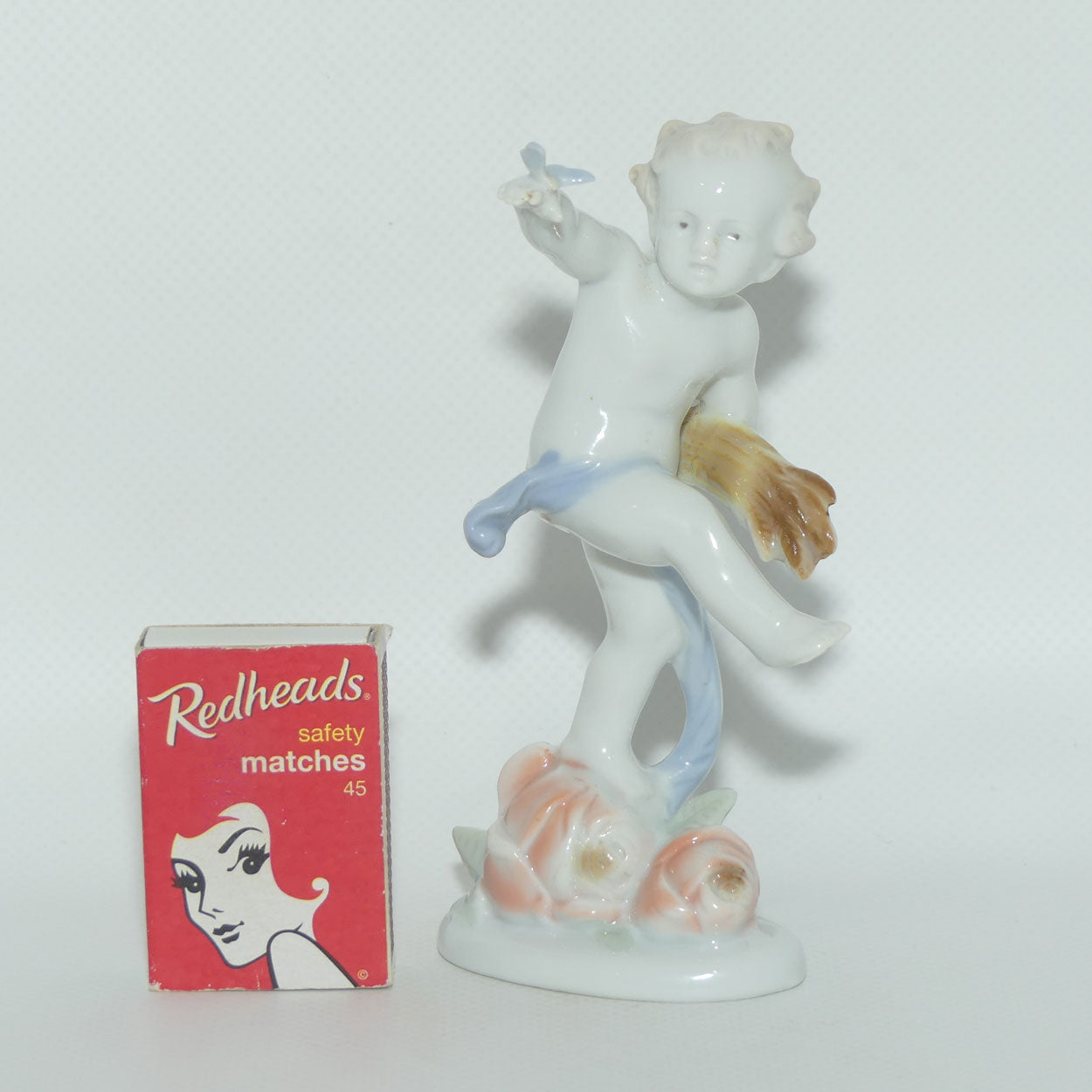 KP Ilmenau Germany figure of Cherub with Butterfly on Hand