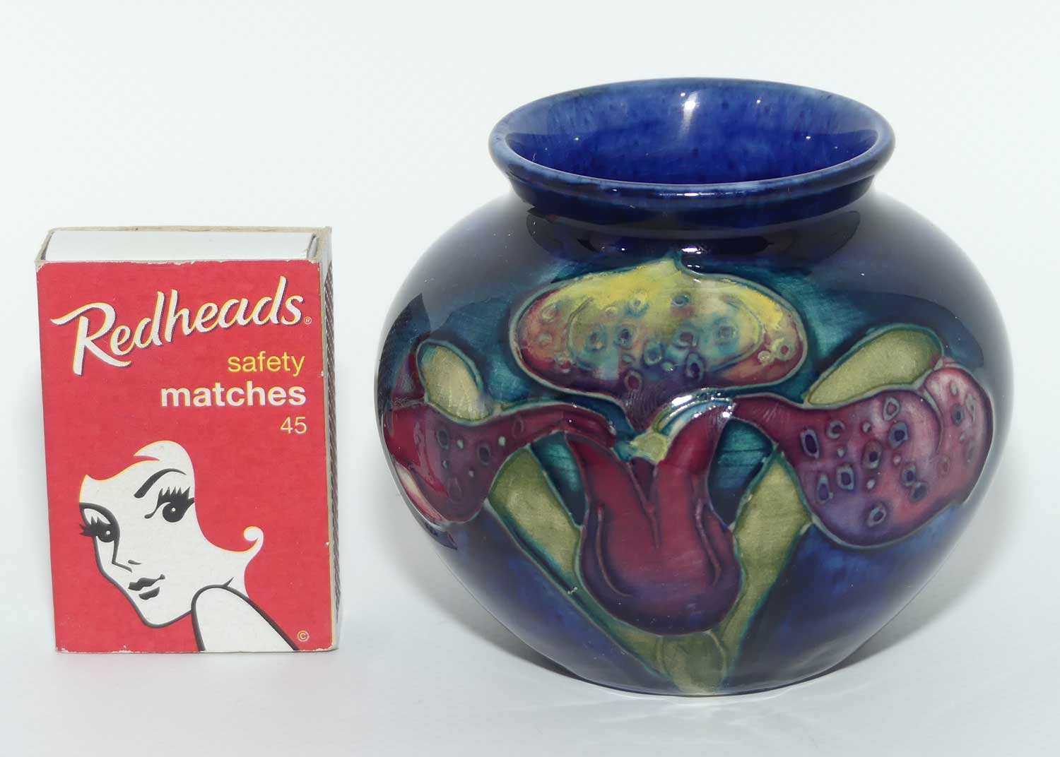 Walter Moorcroft Orchid on Blue Ground vase | miniature round shape