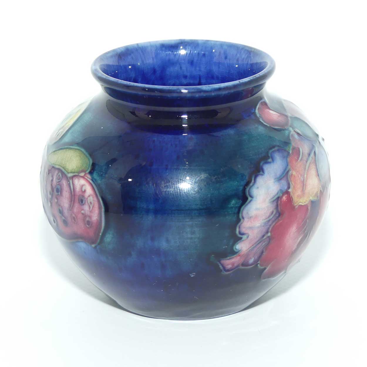 Walter Moorcroft Orchid on Blue Ground vase | miniature round shape