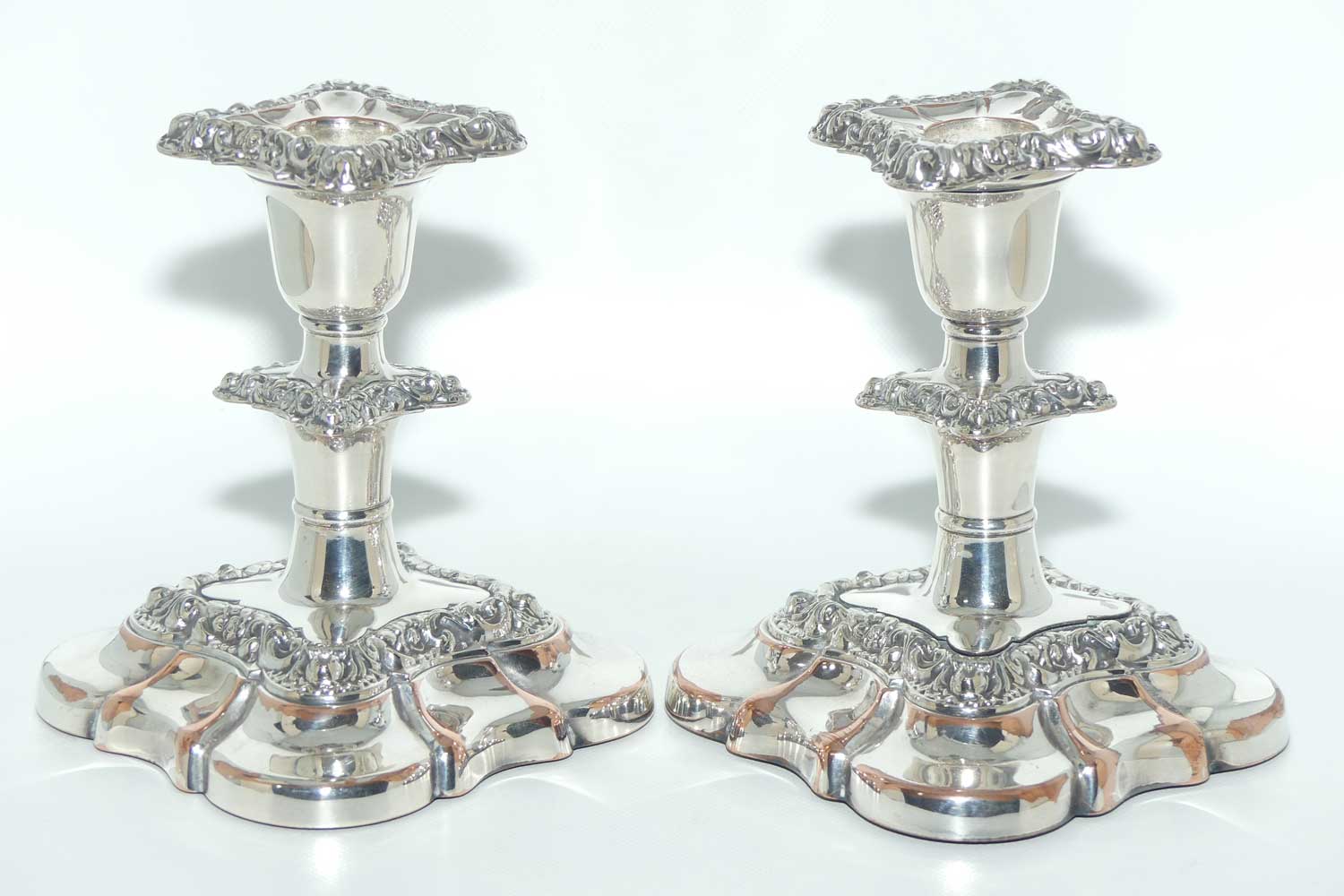 Charming pair of Old Sheffield plate table candleholders