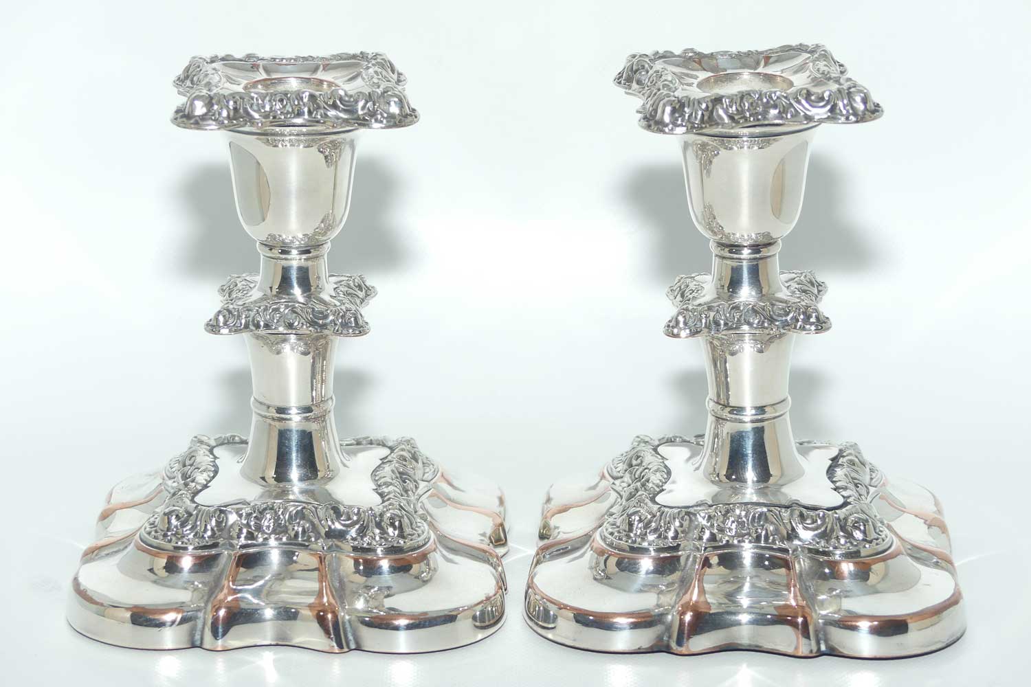 Charming pair of Old Sheffield plate table candleholders