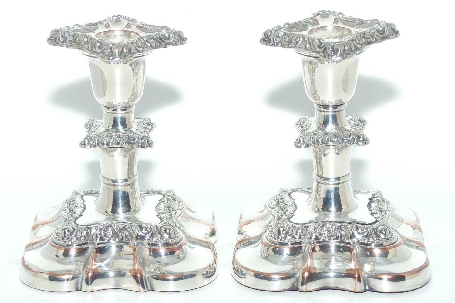 Charming pair of Old Sheffield plate table candleholders