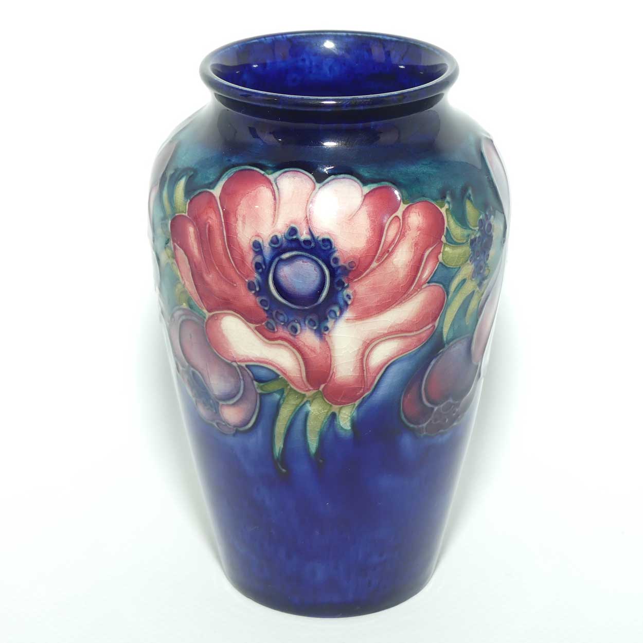 Walter Moorcroft Anemone on Blue ground small reverse tapering vase