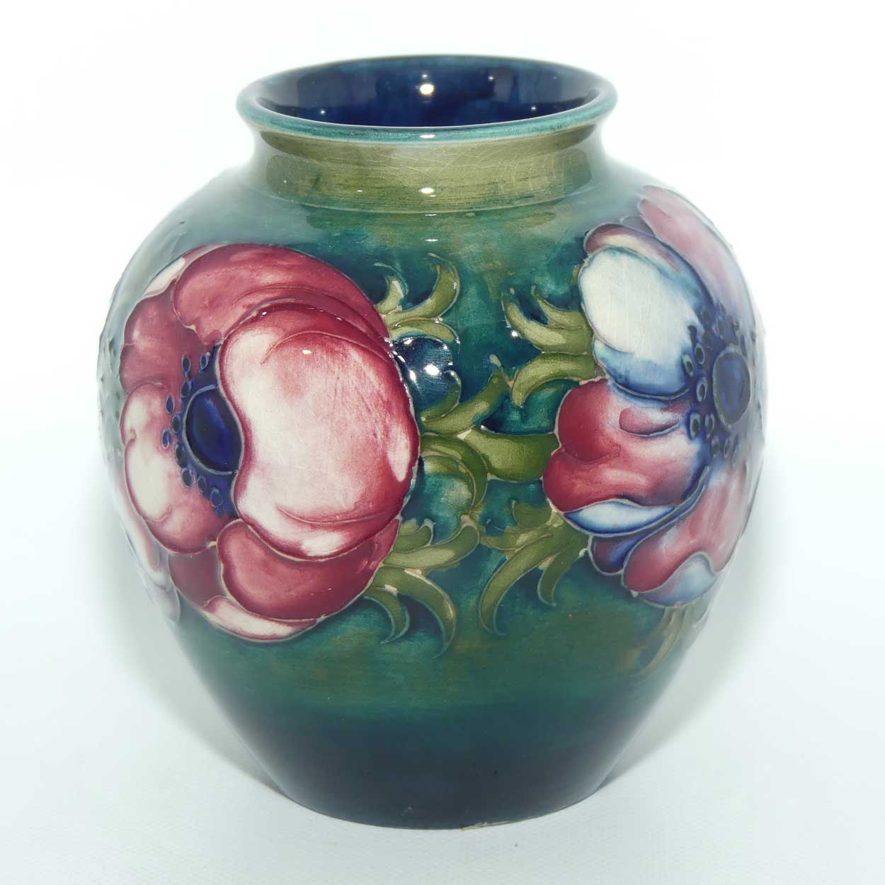 Walter Moorcroft Anemone on Green to Blue ground vase | 10cm