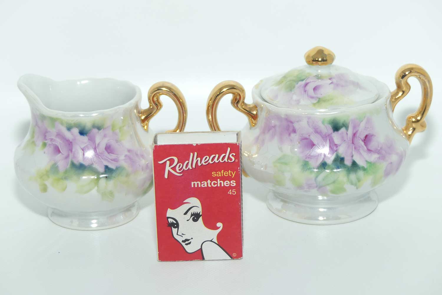 Australian China Painting milk and sugar decorated with Mauve flowers | by Paula Atack 1986