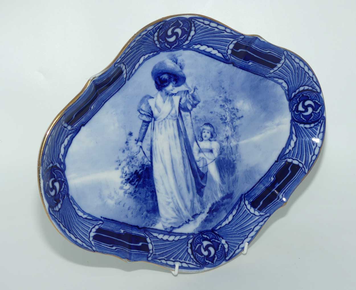 Royal Doulton Blue Childrens Aubrey pattern border diamond shape serving plate D1680 (Woman with child holding cloak)