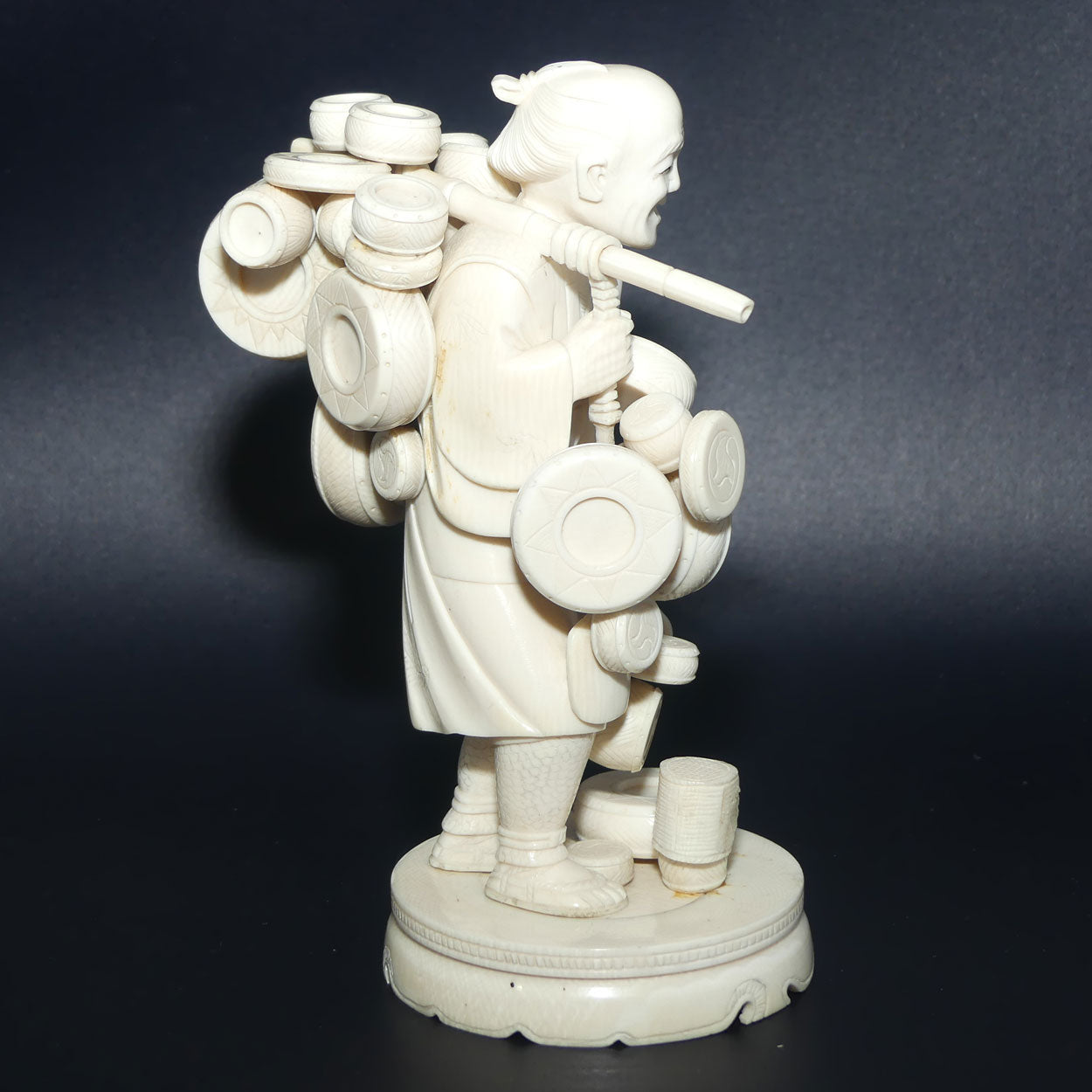 Japanese Carved Ivory Okimono figure on wooden base | Basket Vendor | Meiji period | signed