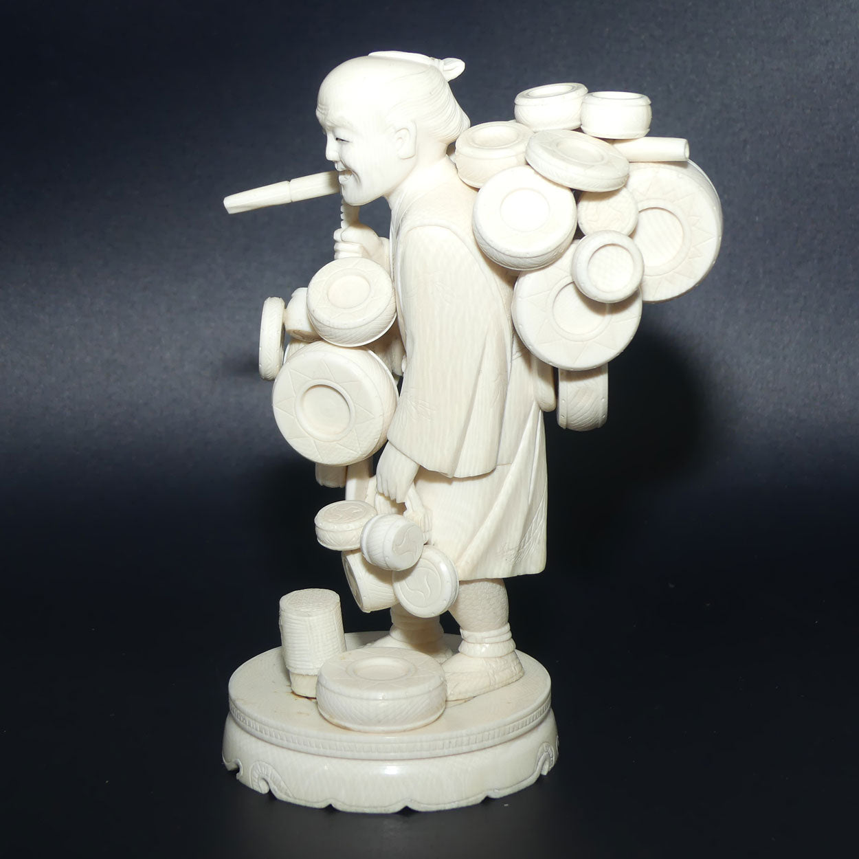 Japanese Carved Ivory Okimono figure on wooden base | Basket Vendor | Meiji period | signed