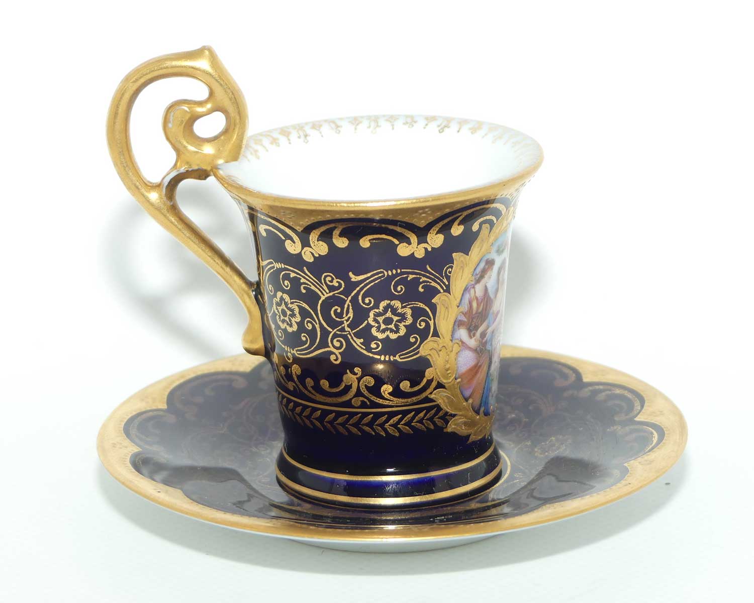 Superb Bavarian Gilt Decorated demi tasse cup and saucer | Grecian scene