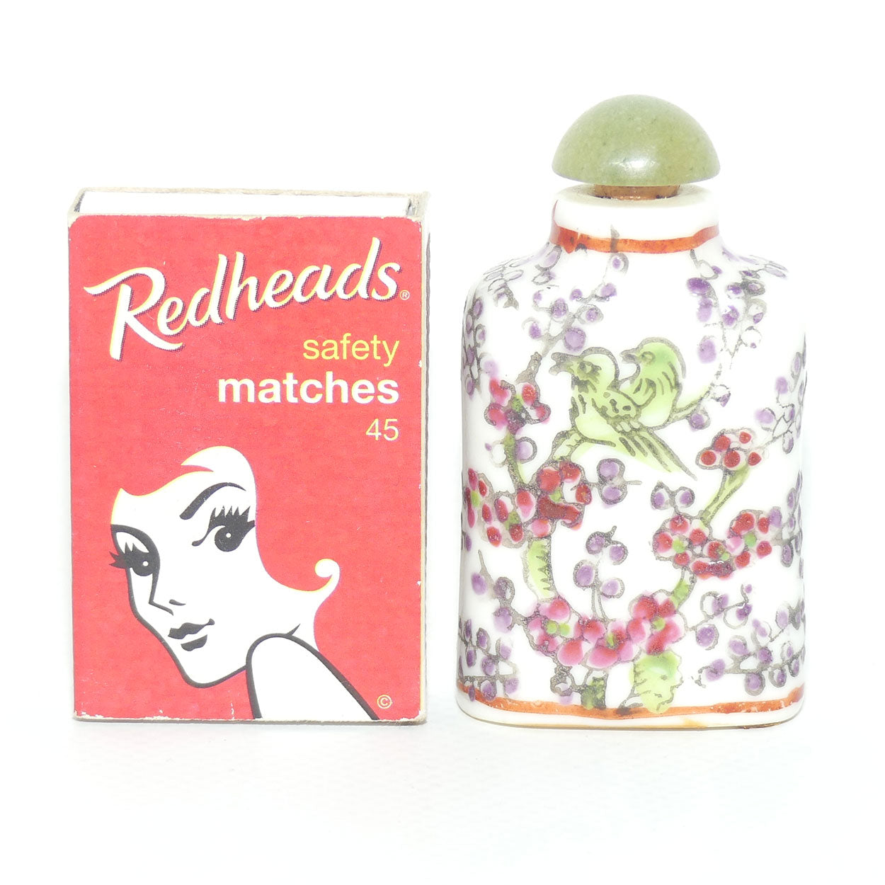 Chinese snuff bottle with greenstone stopper | Bird in Apple Blossom Tree