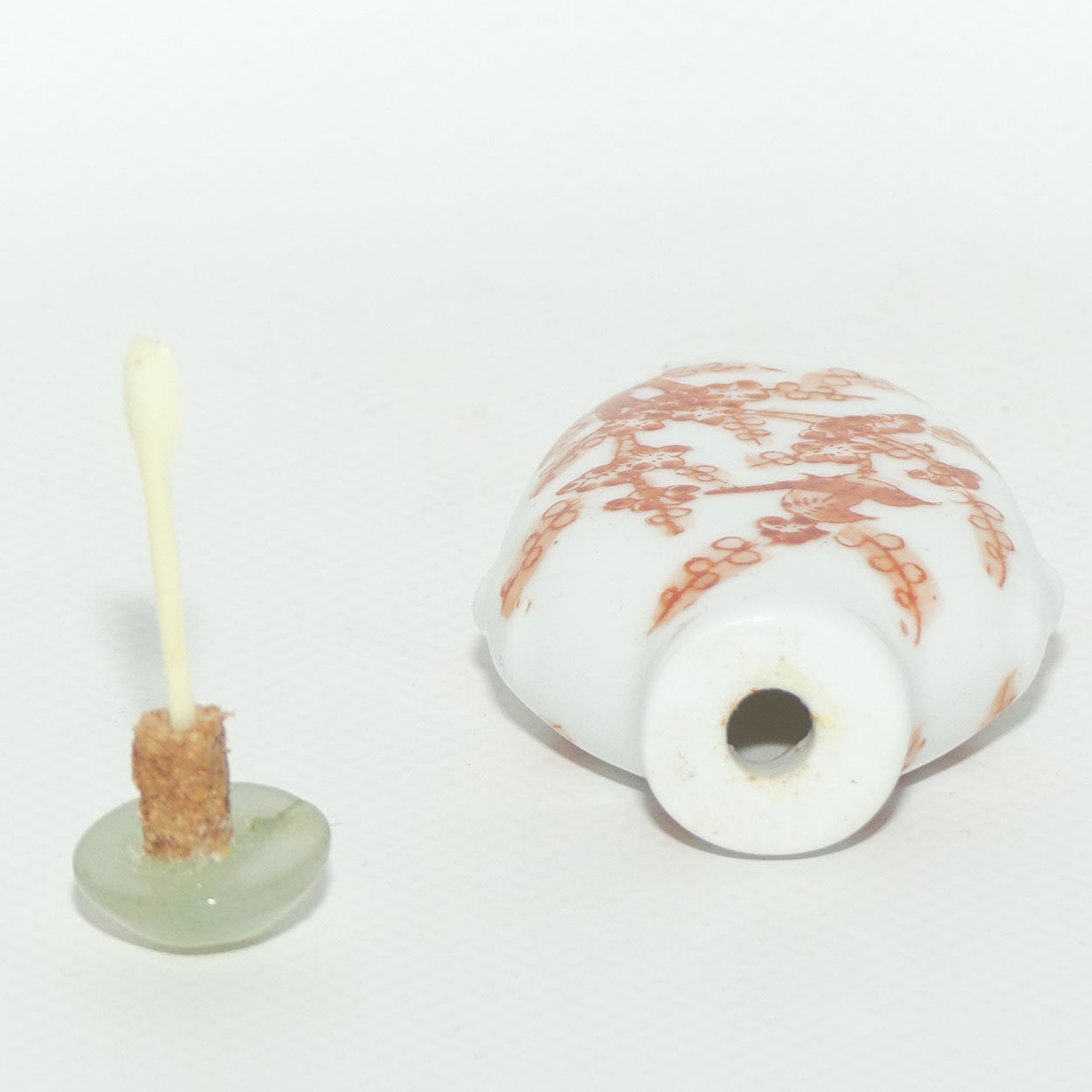 Chinese snuff bottle with greenstone stopper | Iron Red Birds in Cherry Blossom Tree