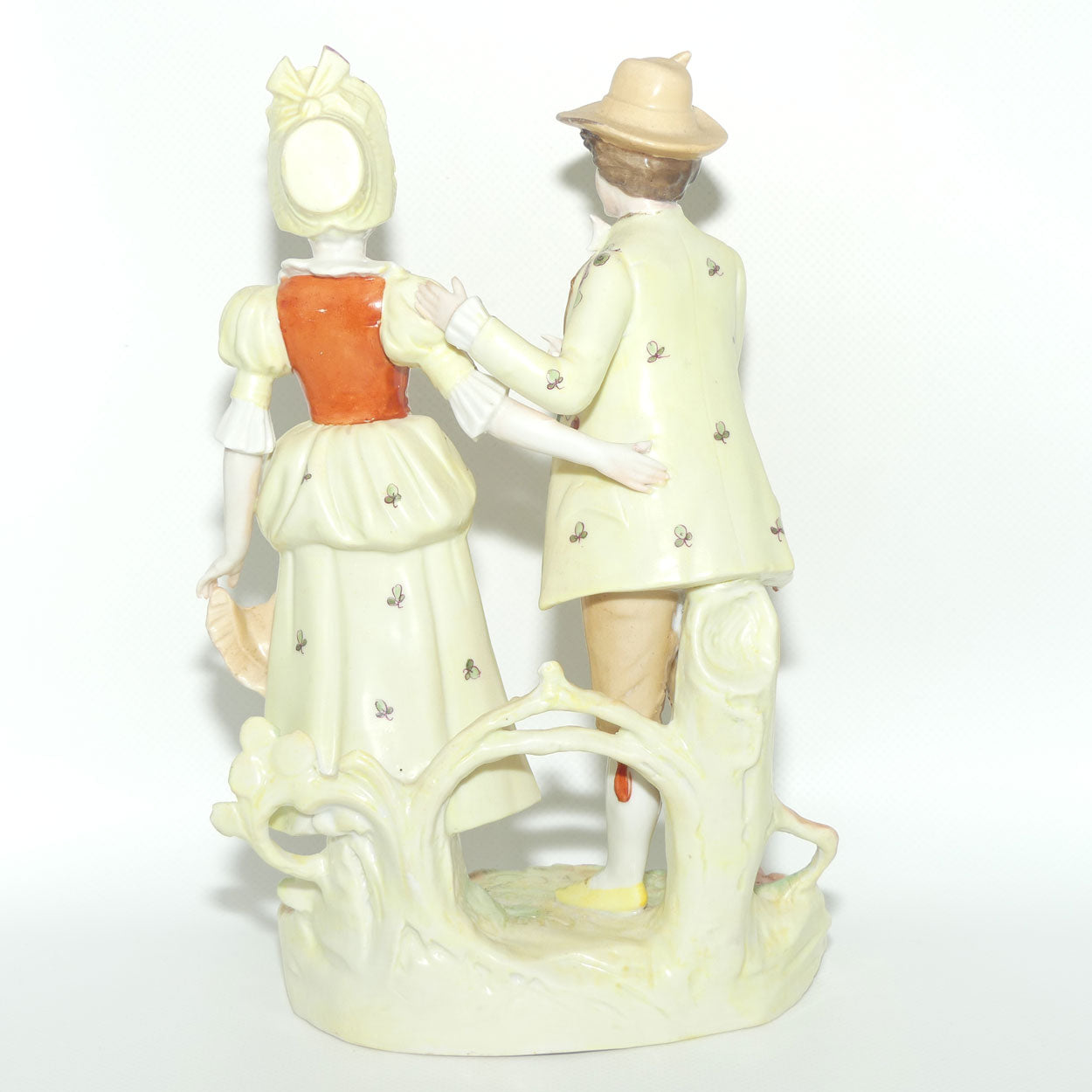 Victorian era Lady and Gent bisque figurine group