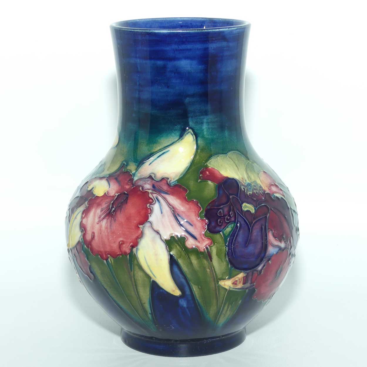 Walter Moorcroft Orchid on Dark Blue Ground bulbous vase