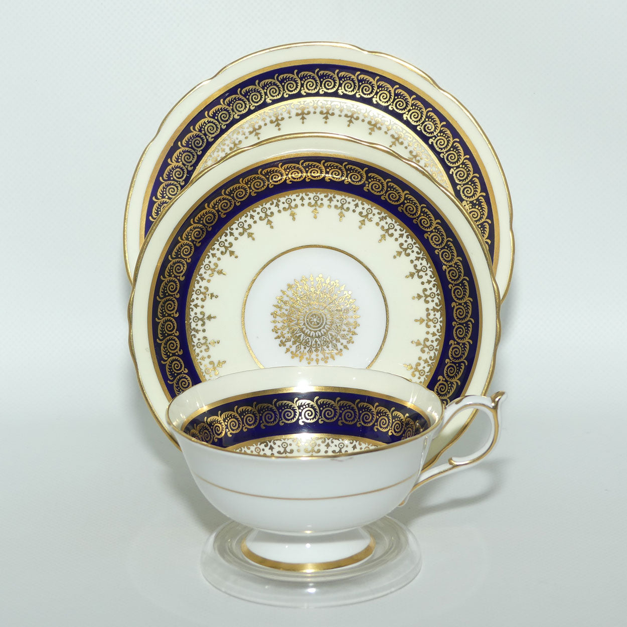Paragon Bone China Royal Blue and Gilt trio