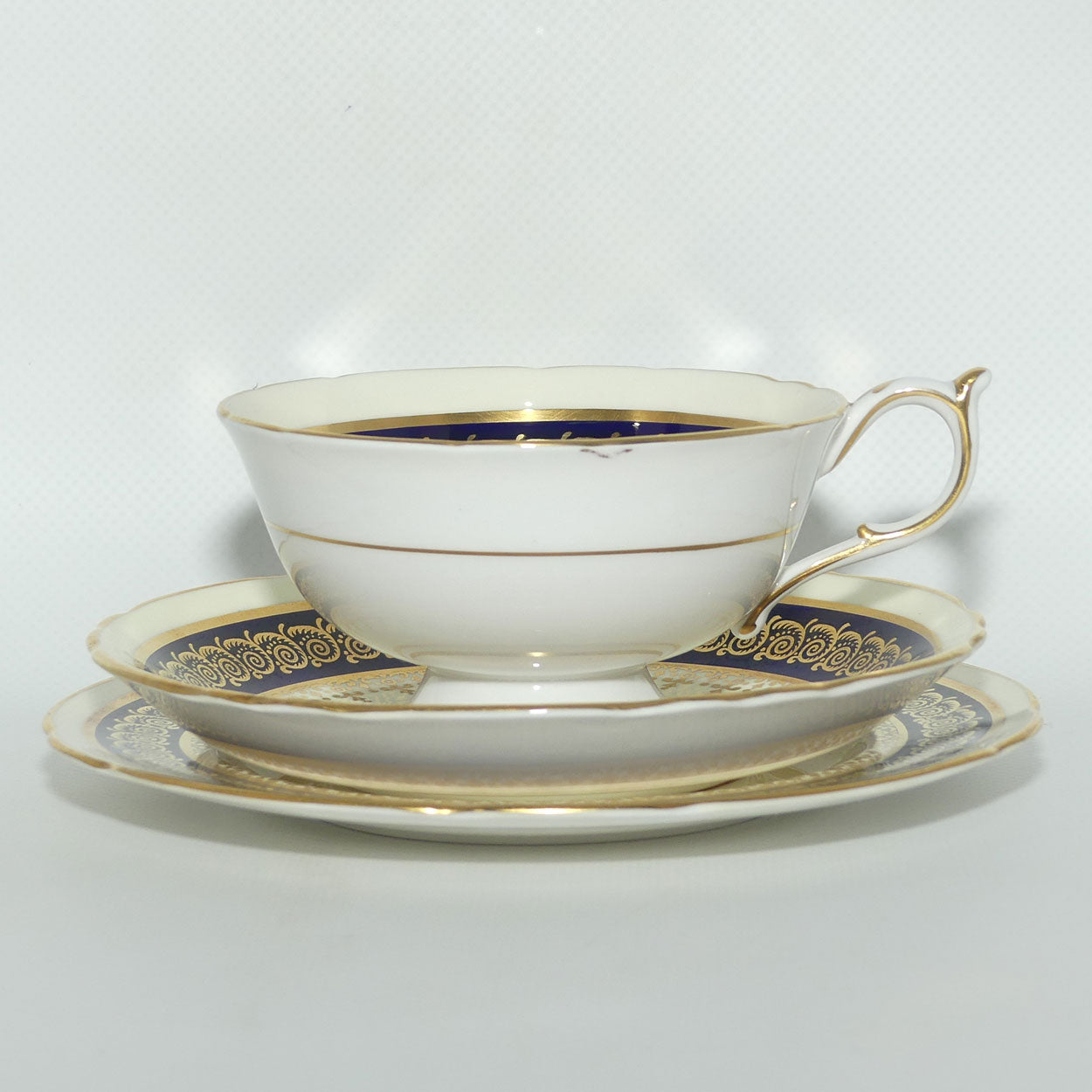 Paragon Bone China Royal Blue and Gilt trio