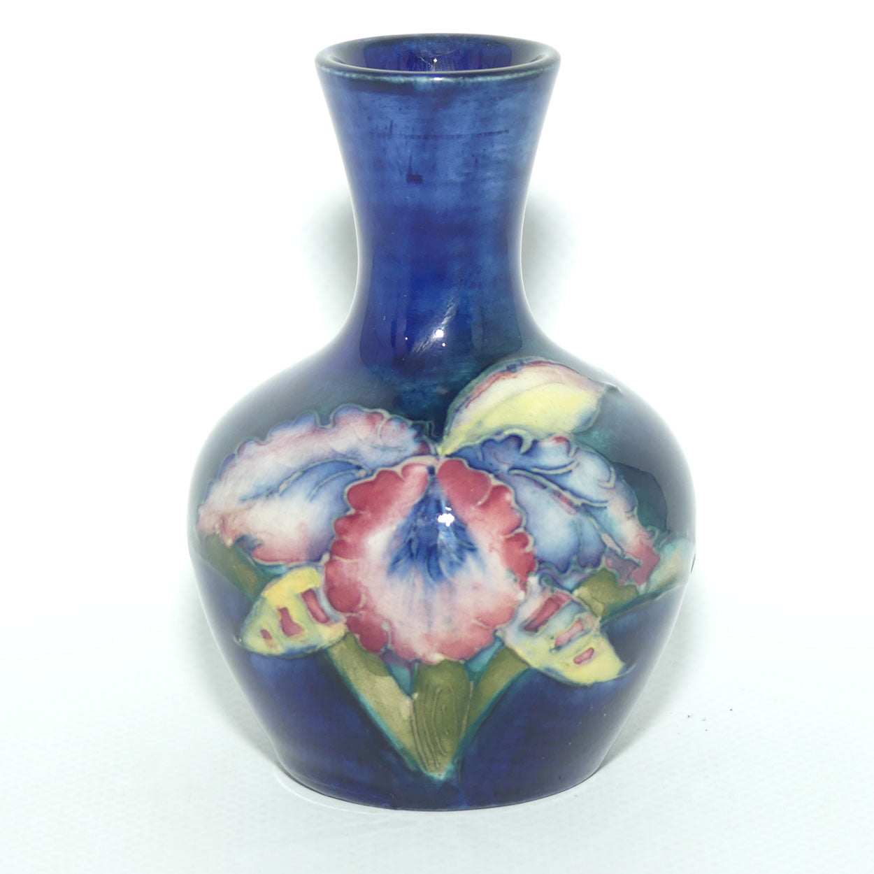 Walter Moorcroft Orchid on Blue Ground narrow neck miniature bud vase