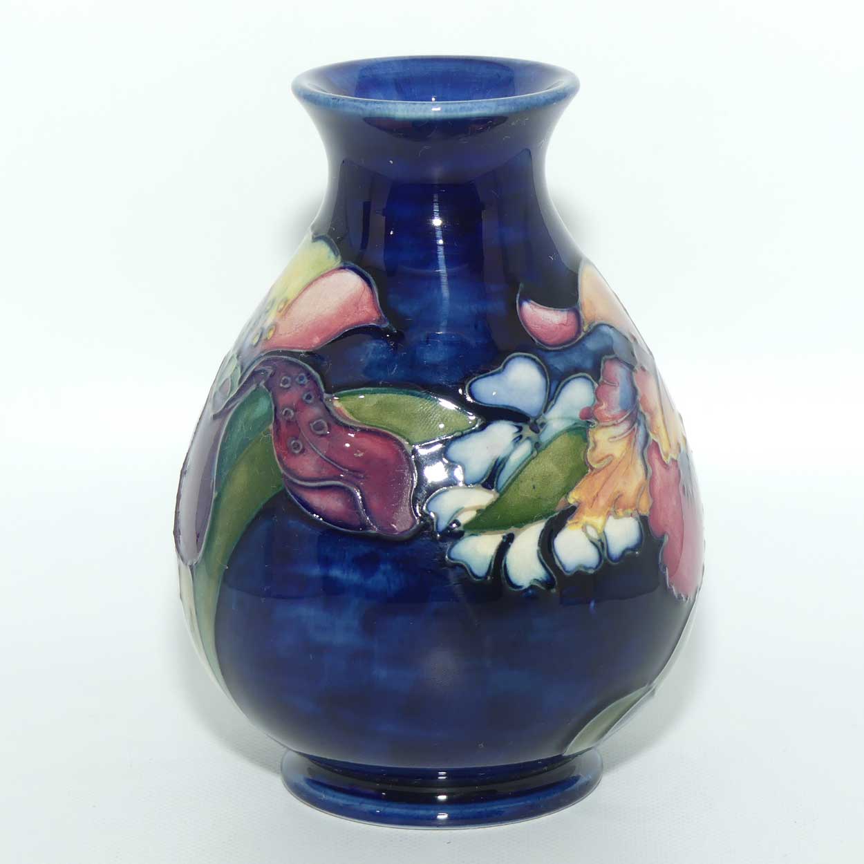Walter Moorcroft Orchid on Dark Blue Ground vase | Shape 7/5