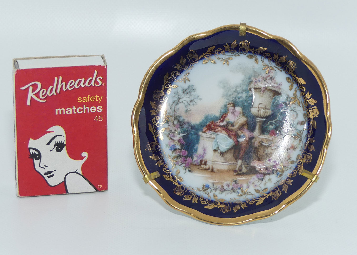 Limoges France Rehausse Main Blue Border courting couple plate in frame