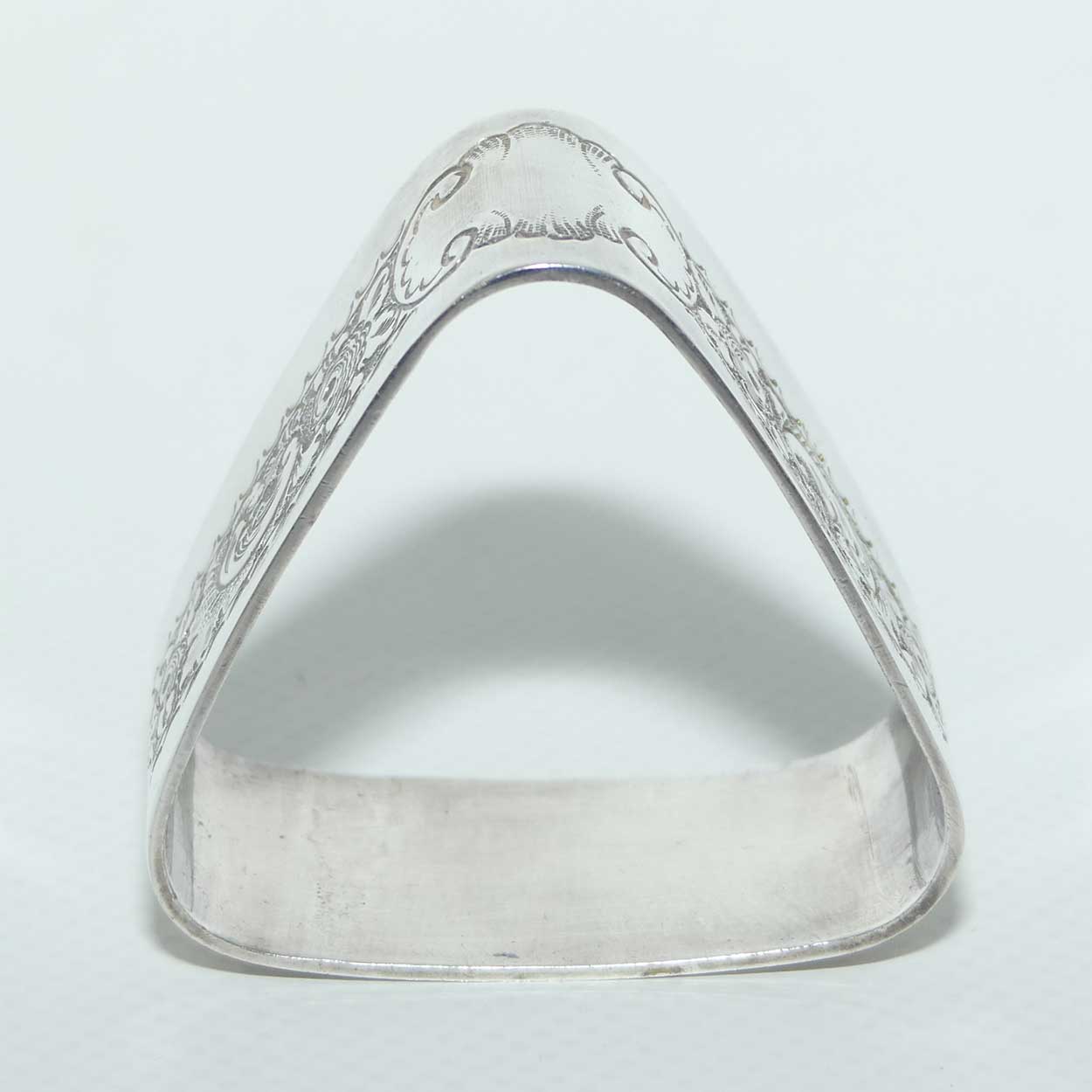 Edwardian era set of 6 Embossed triangular Silver plated napkin rings