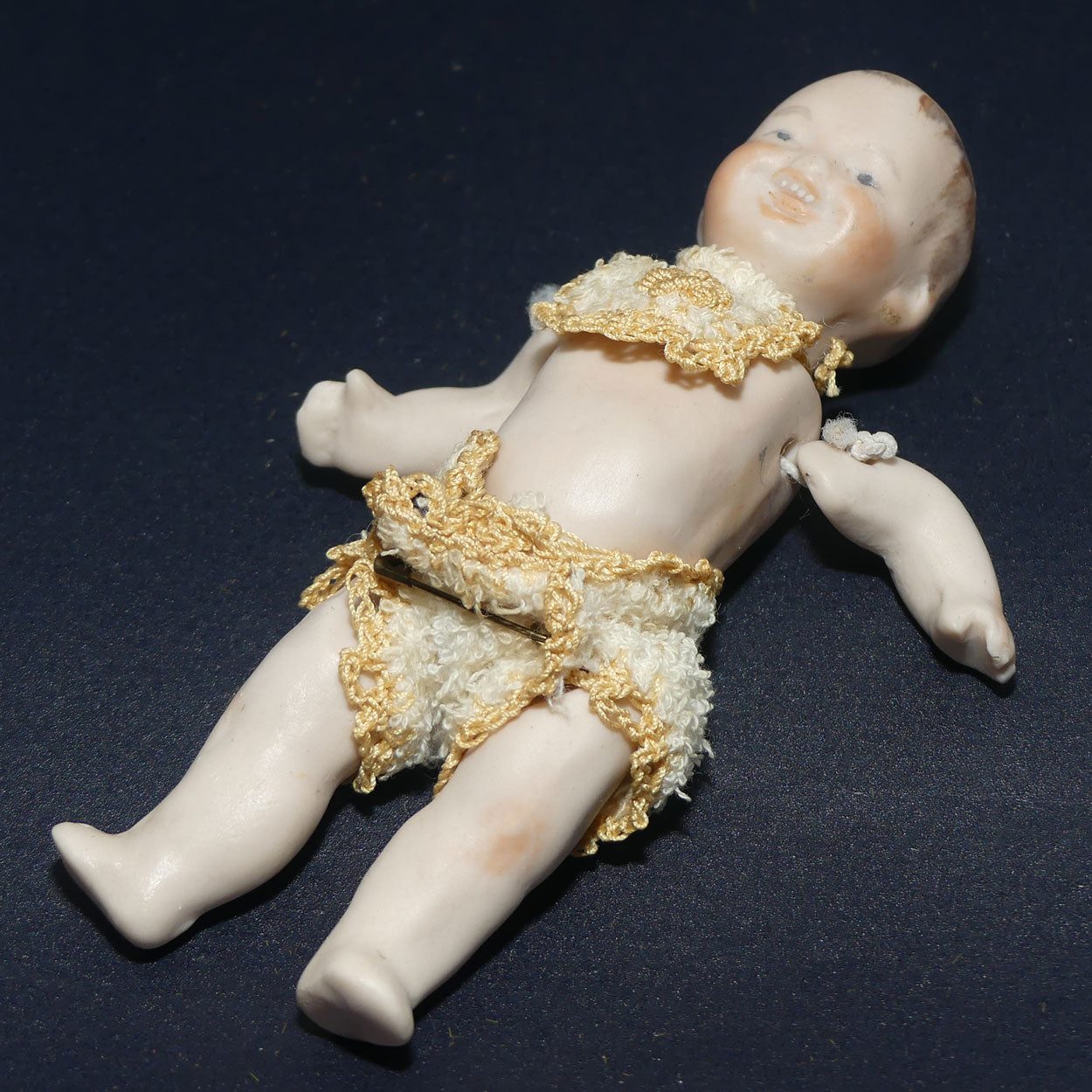 Bisque jointed and dressed baby boy doll | stringing needs tightening