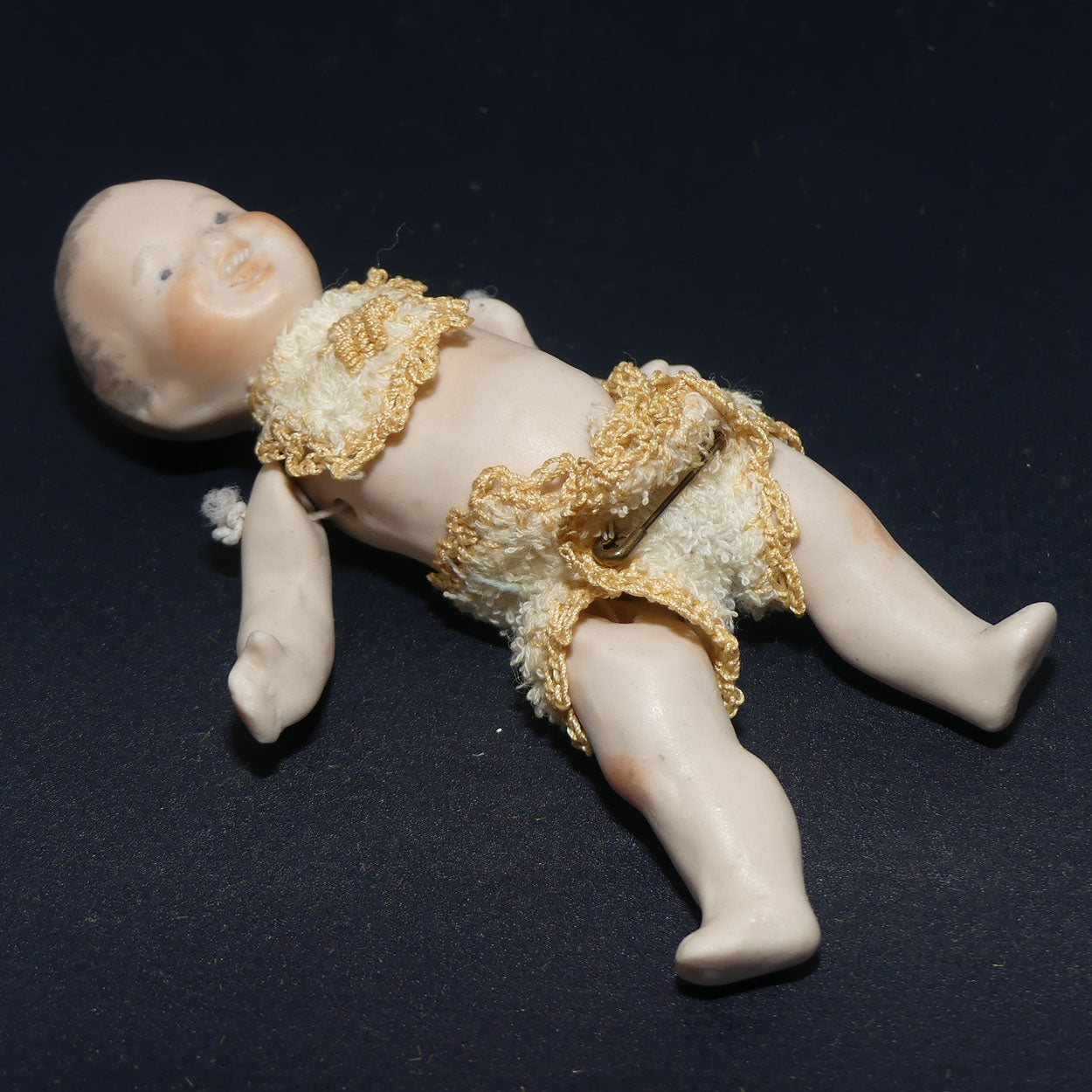 Bisque jointed and dressed baby boy doll | stringing needs tightening