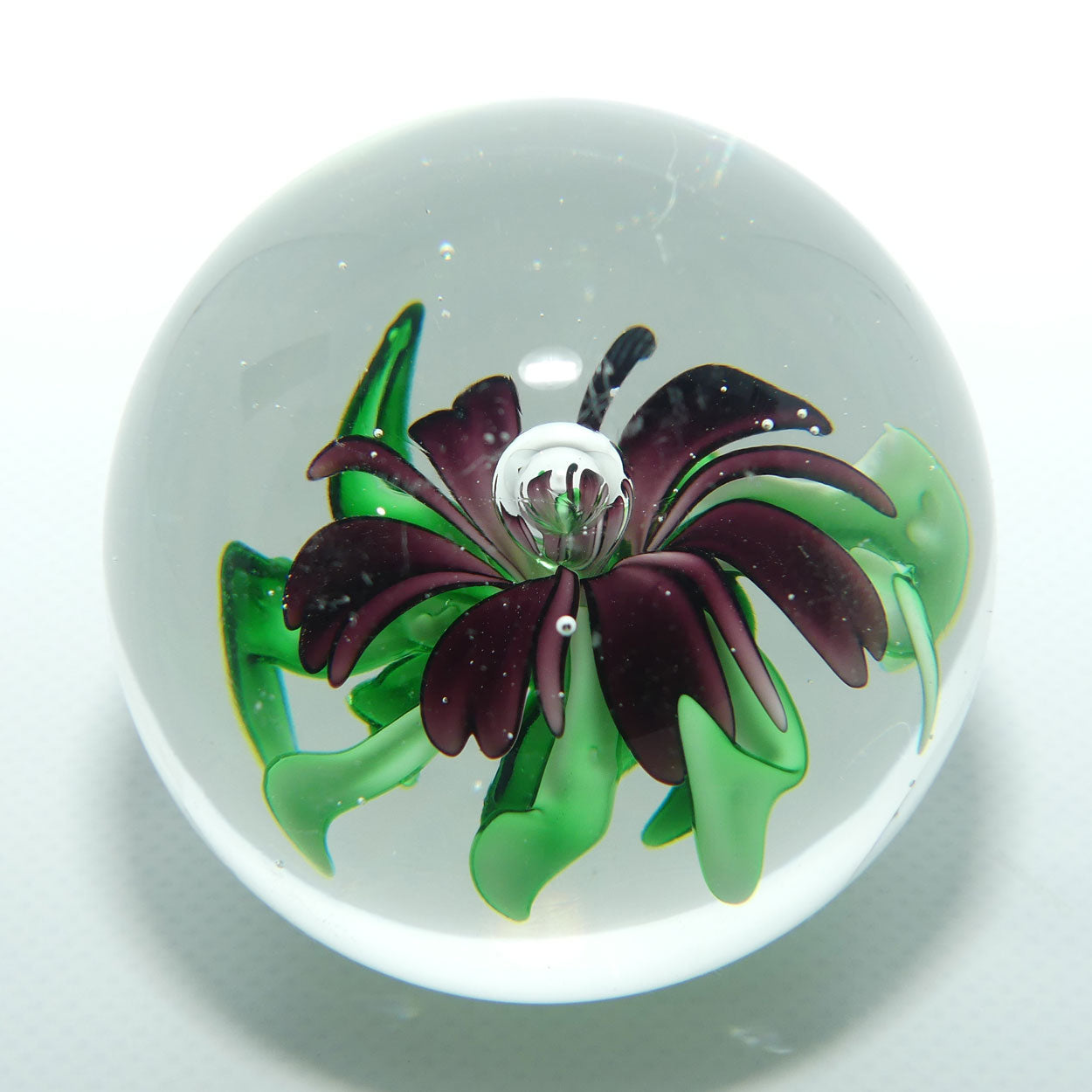 Controlled bubble with Purple and Green Flower large paperweight