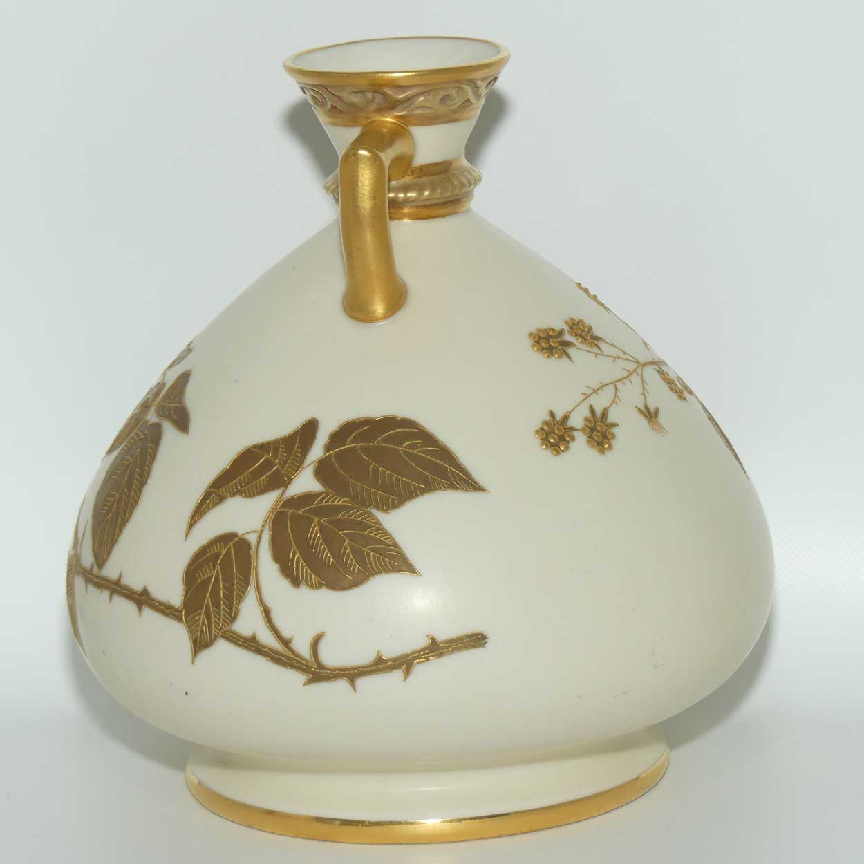 Royal Worcester Blush Ivory hand painted bulbous gilt vase