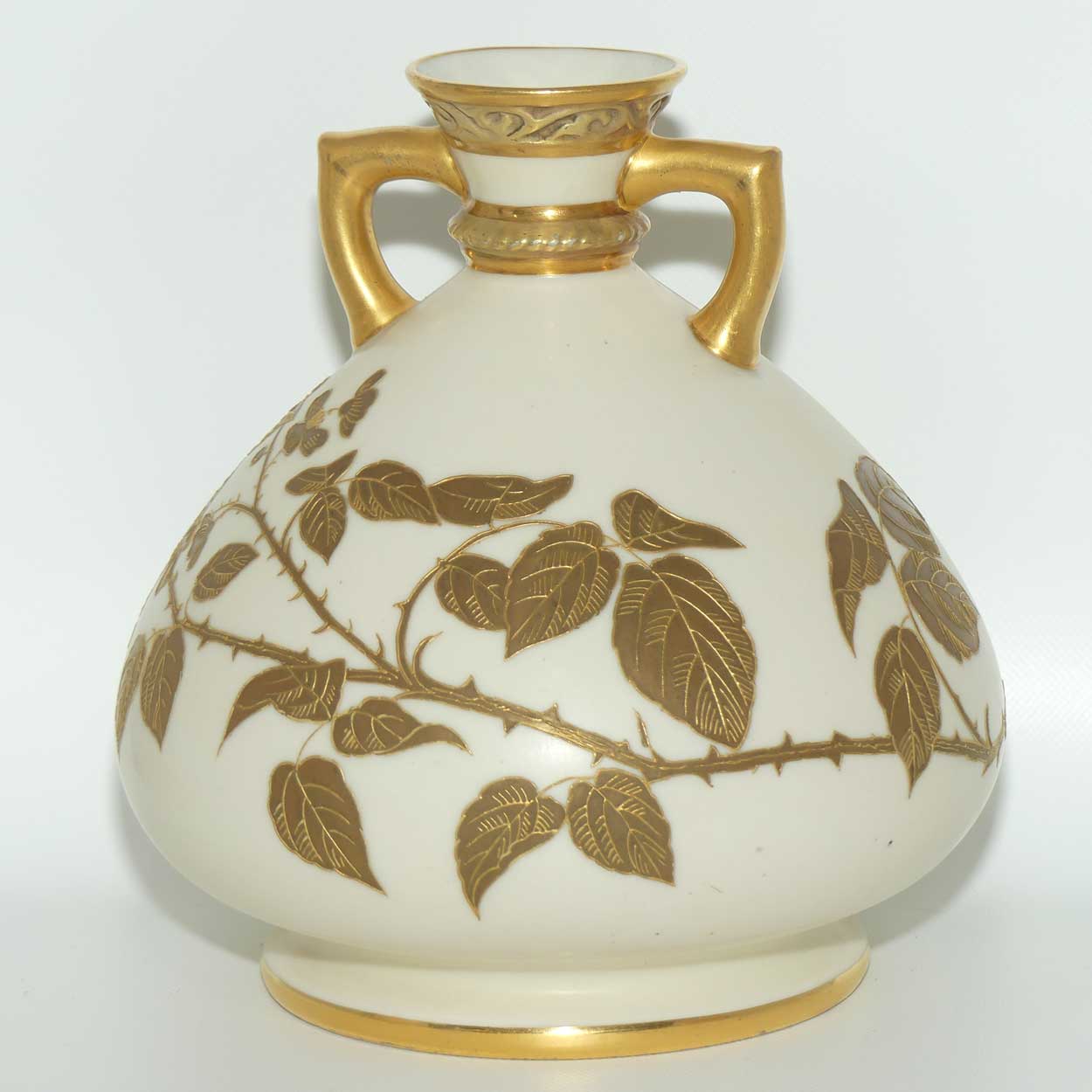Royal Worcester Blush Ivory hand painted bulbous gilt vase